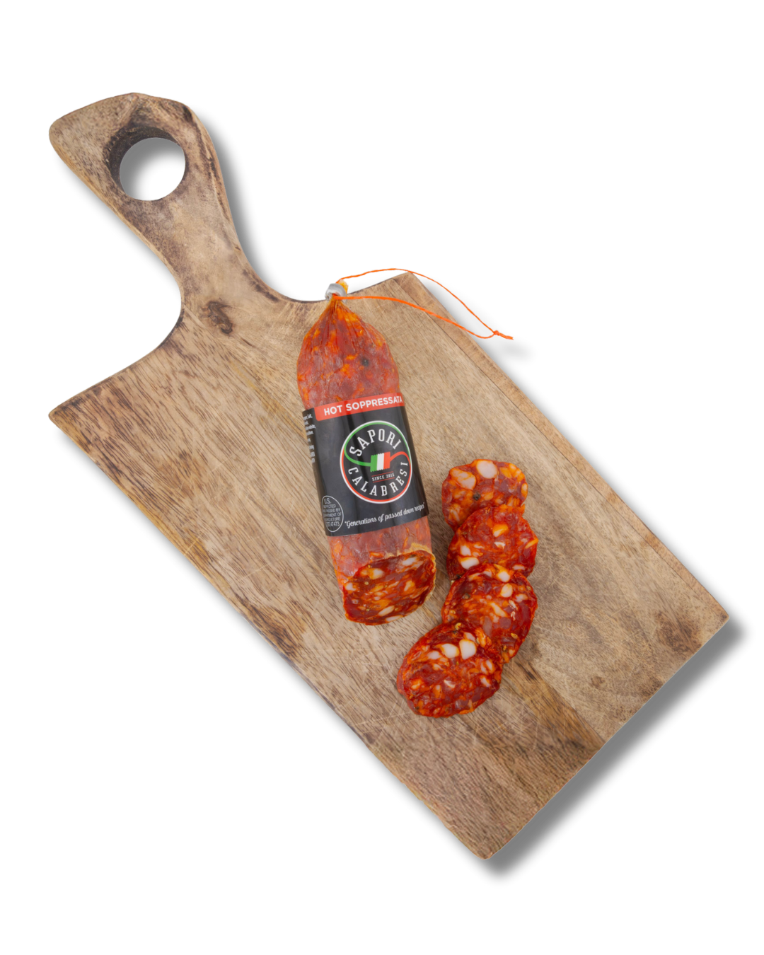 Sliced spicy salami on a wooden cutting board with a black background.