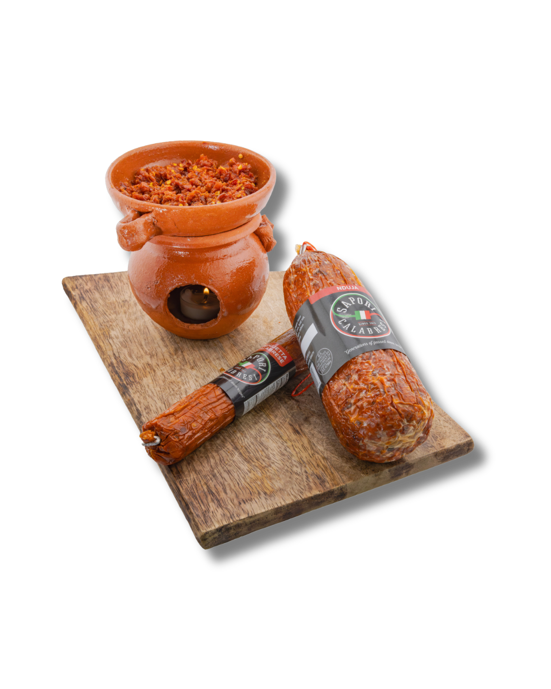 Traditional Mexican spices with a clay pot and two types of cured sausages on a wooden board.