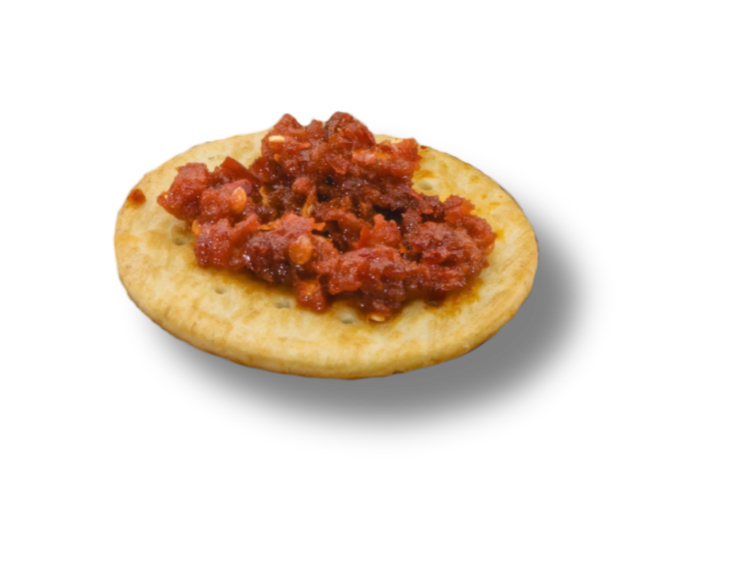 A cracker topped with Ndujetta Calabrese