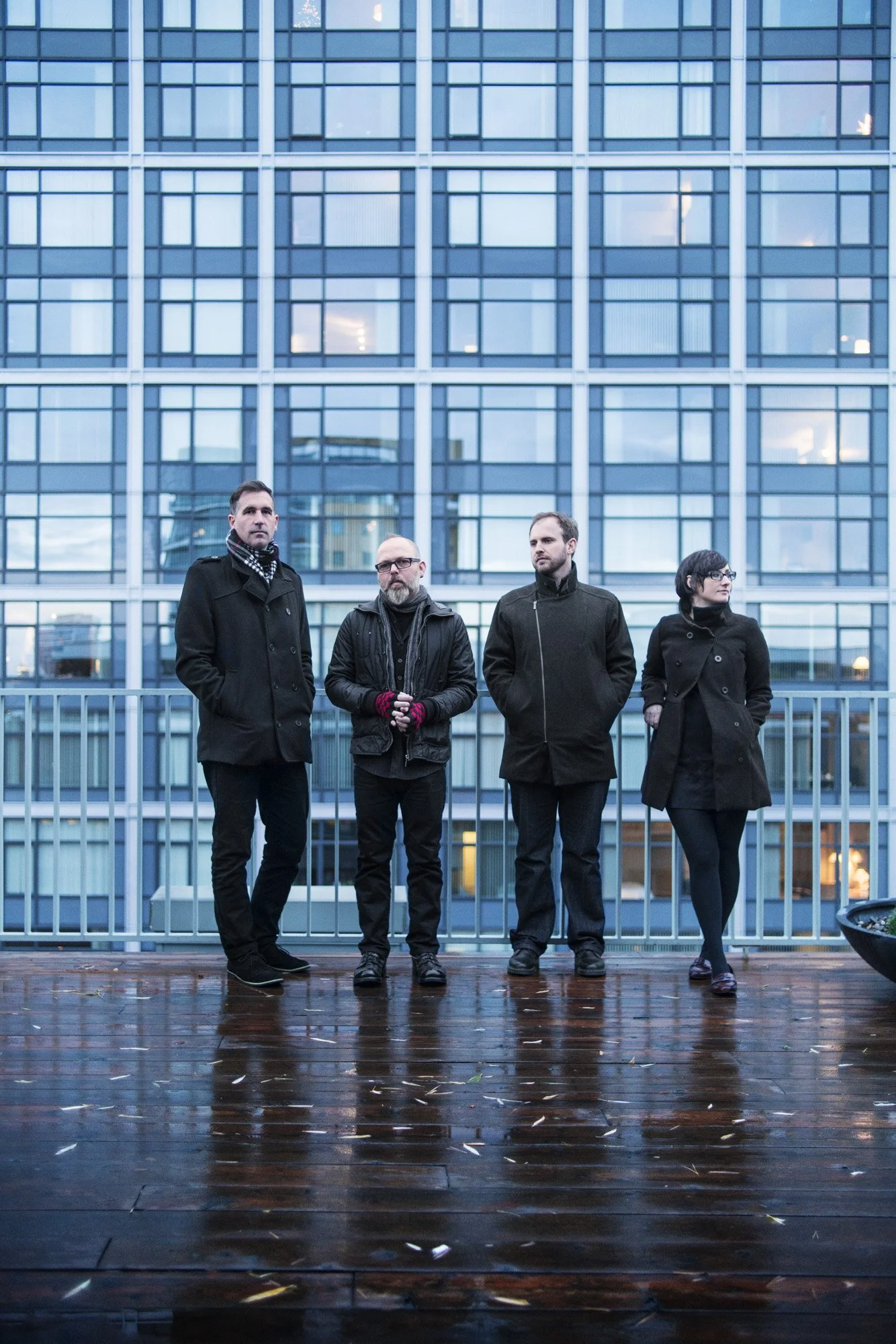The band, Hawks Do Not Share, on a rooftop in downtown Portland.