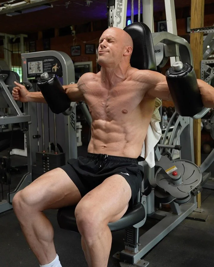 SHOULDERS &amp; CHEST WORKOUT 

Behind head military press
 - 5x20

Db upright row
 - 5x20

Decline machine fly 
 - 4x15

Db side raises 
 - 4x12-15 (last set drop set)

Bench press
 - 3x10 + 1/4 rep

Db shrug
 - 4x12-15

Cable rear delt row
 - 3x20
