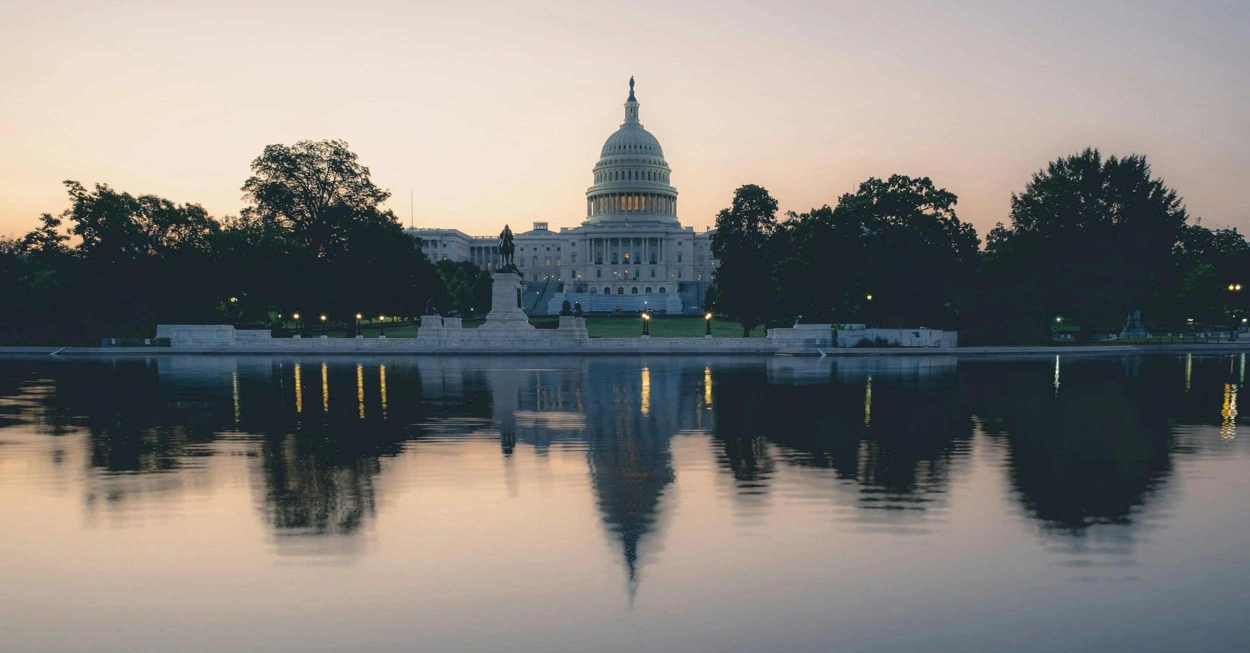 The US Capitol Building viewed from across the water.