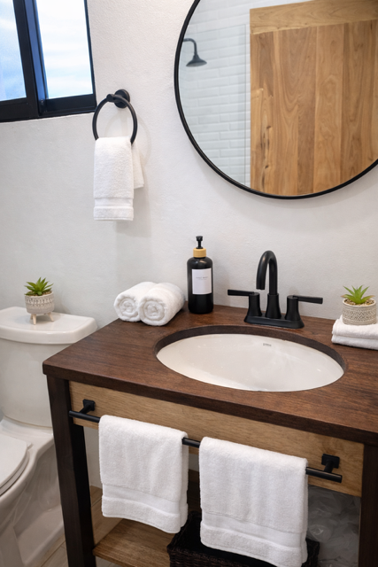Modern tropical bathroom retreat. Clean lines, natural textures and spa-like calm