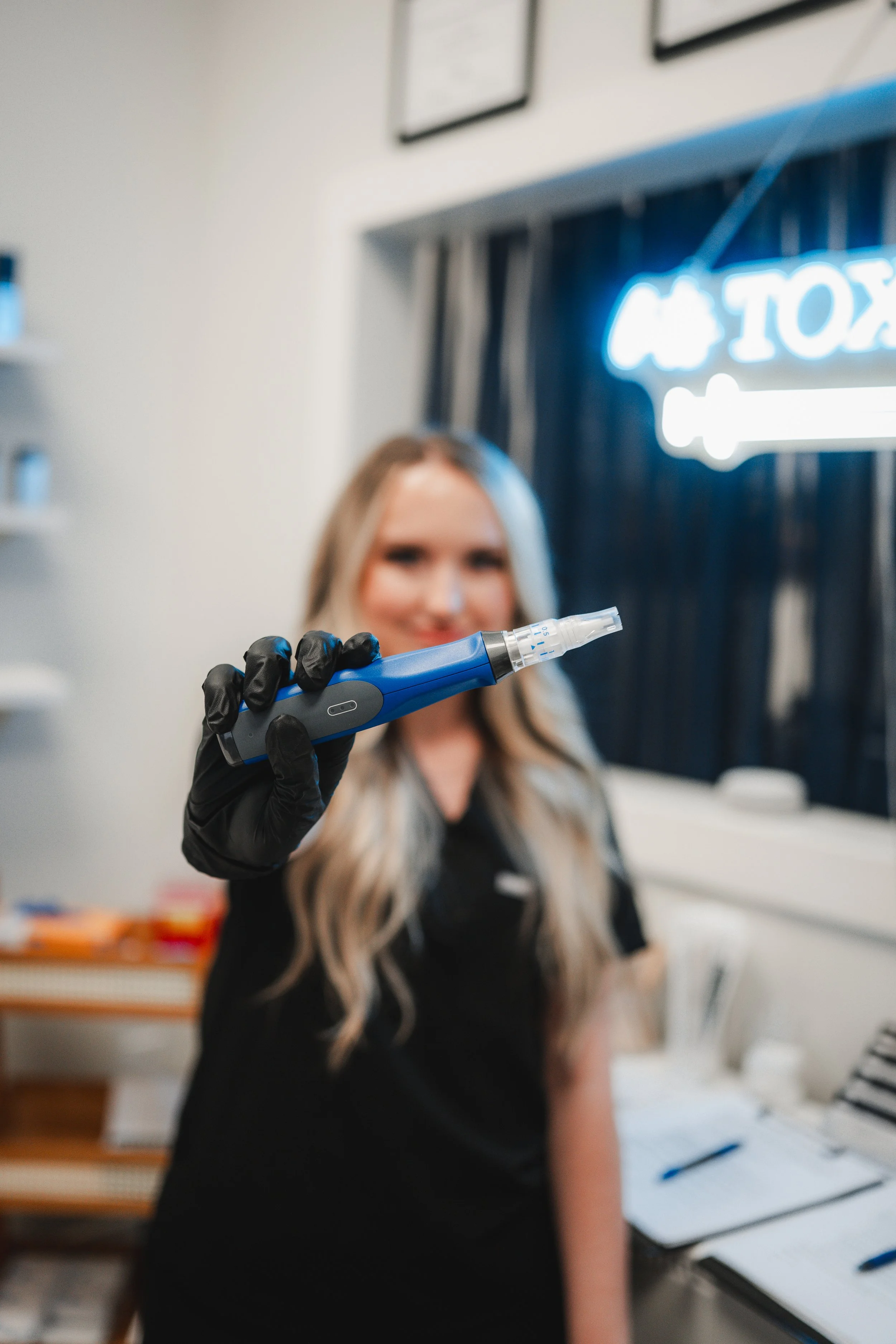 Provider holding Microneedling device