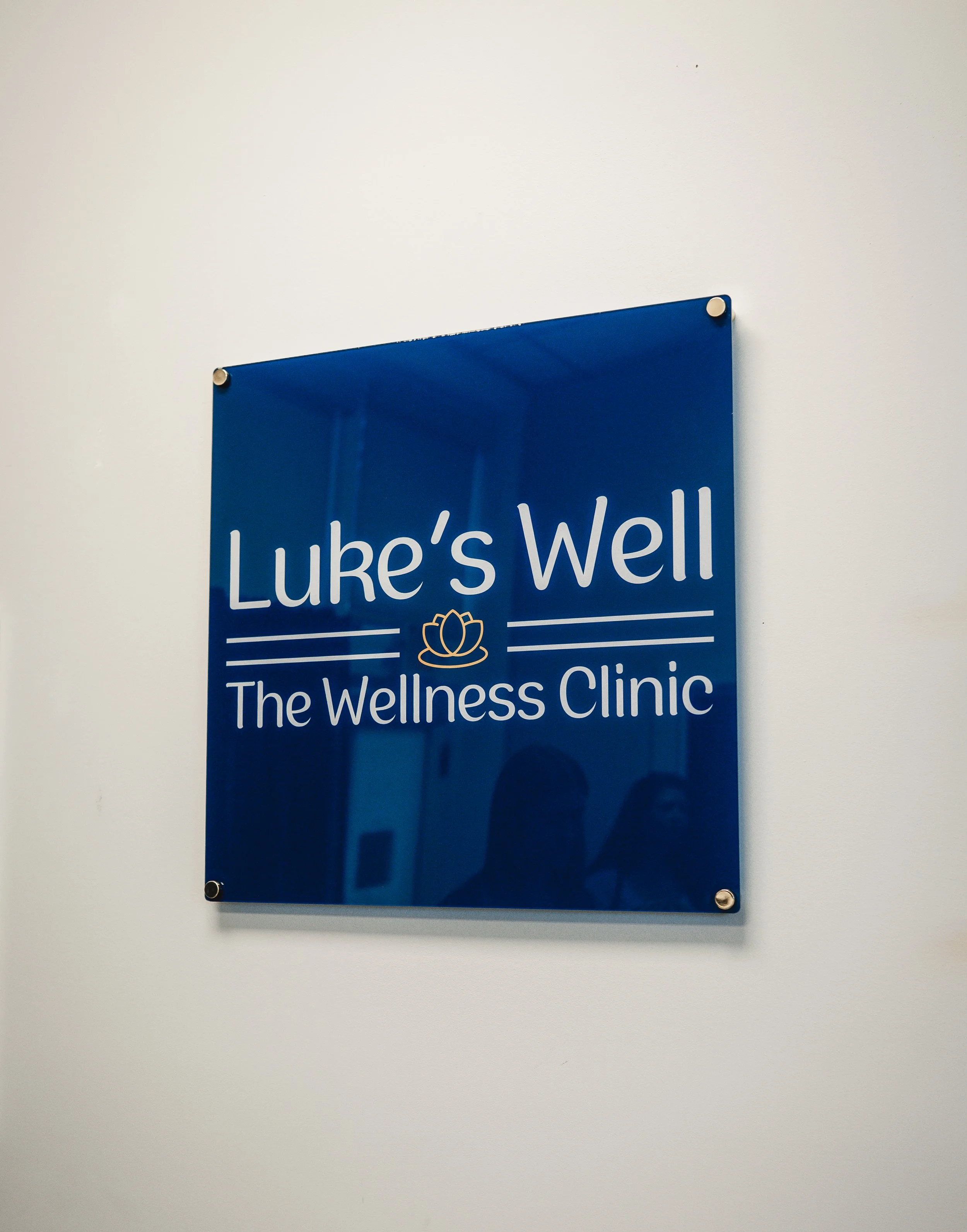 Lukes Well Business Sign