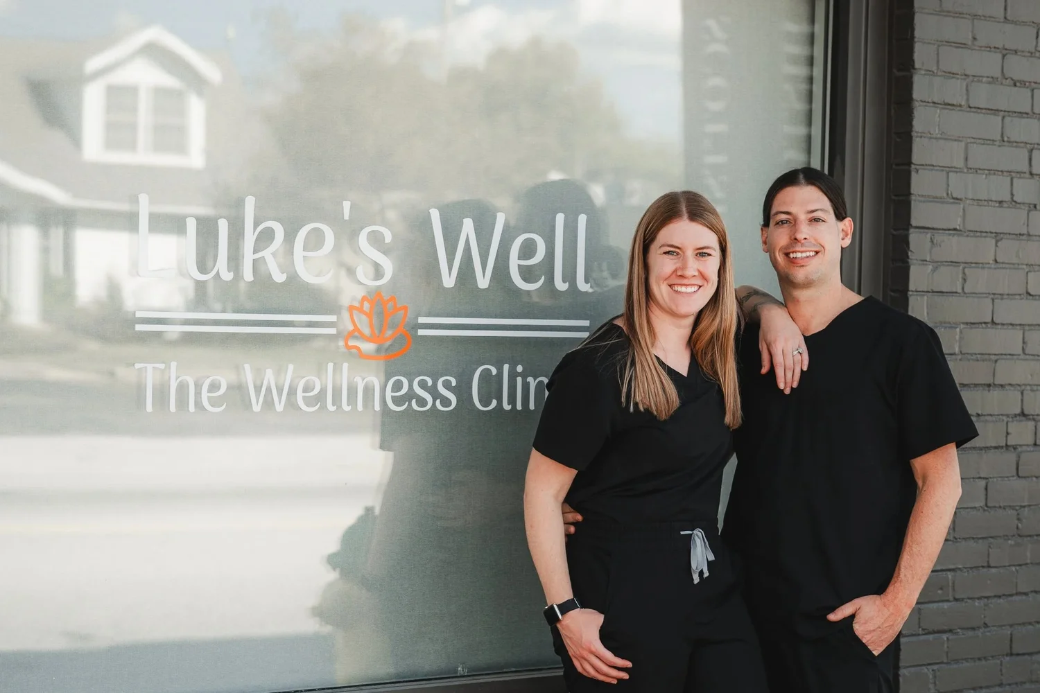 Britt and Shea in scrubs outside Luke’s Well in Scottsburg.