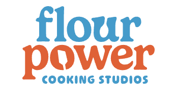 Flour Power Cooking Studios logo with blue and orange text