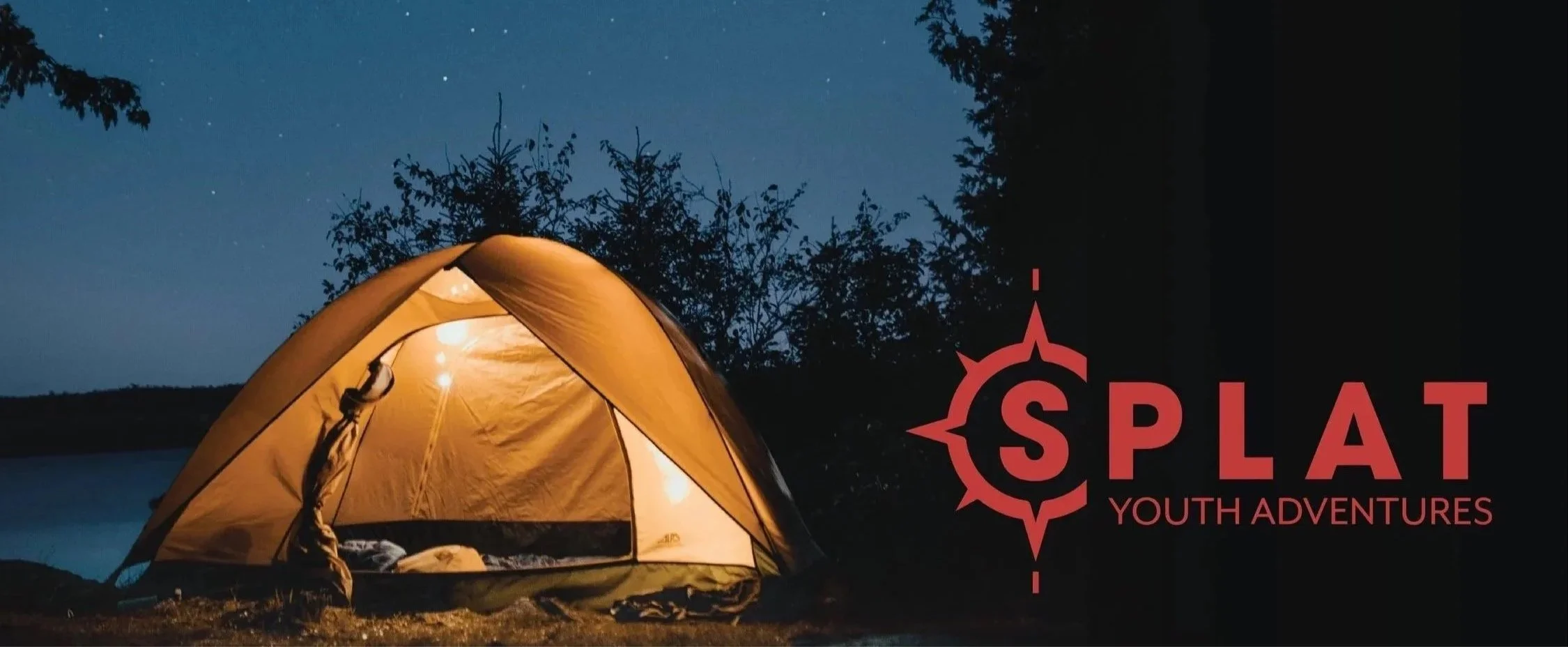 A camping tent illuminated from inside, set up near a body of water at night, with trees and a starry sky in the background. The logo and text of 'SPLAT Youth Adventures' are displayed on the right side of the image.