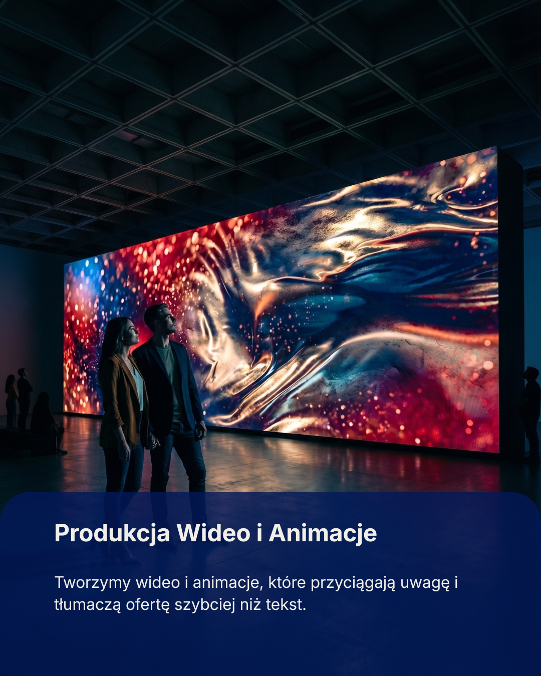 People viewing a large, colorful digital screen with swirling patterns and bright lights in a dark exhibition space.