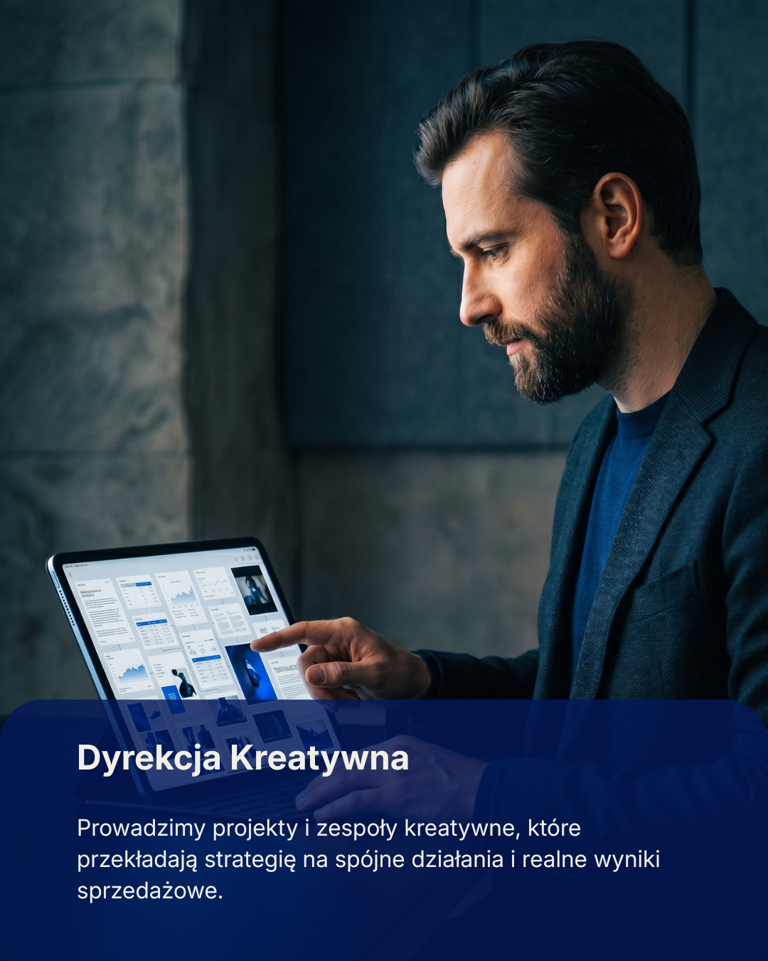 A man with a beard in a suit looking at a tablet displaying charts and graphs, with a blue overlay containing Polish text about a creative director.