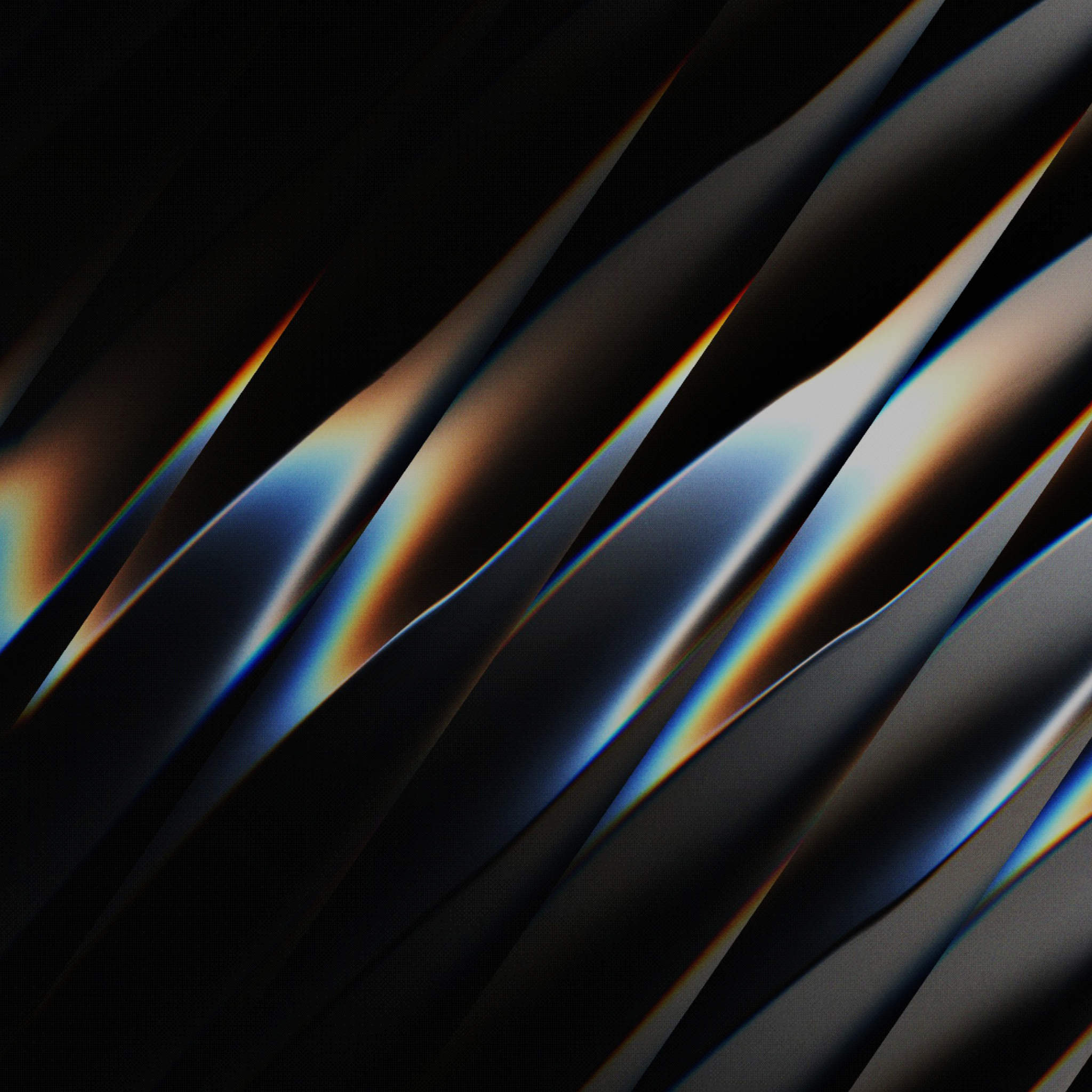 Close-up of glossy black, blue, and orange curved surfaces creating an abstract pattern with vibrant reflections.