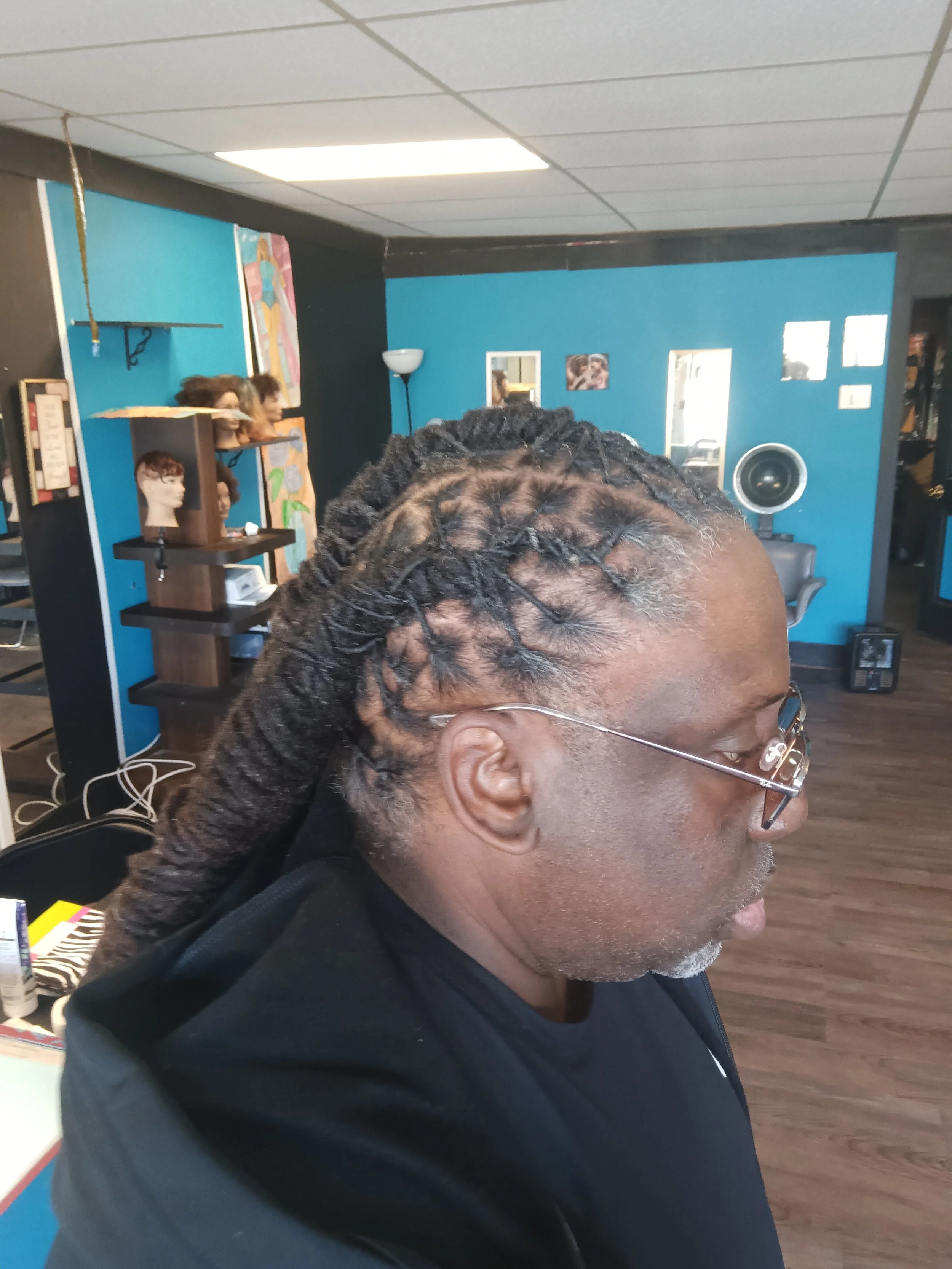 Loc Retwist and style