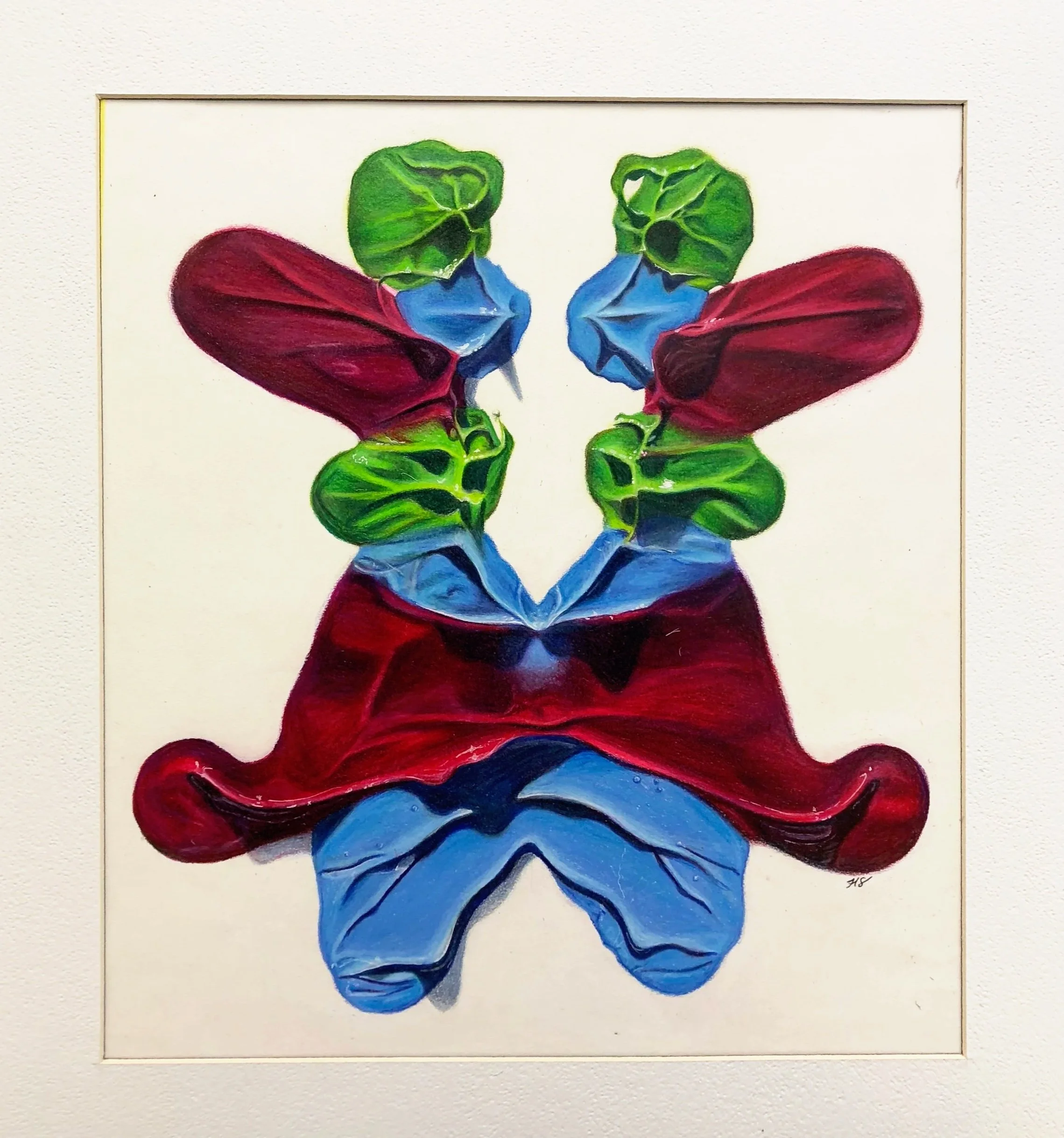 A colorful abstract painting resembling a symmetrical butterfly with green, red, blue, and purple hues.