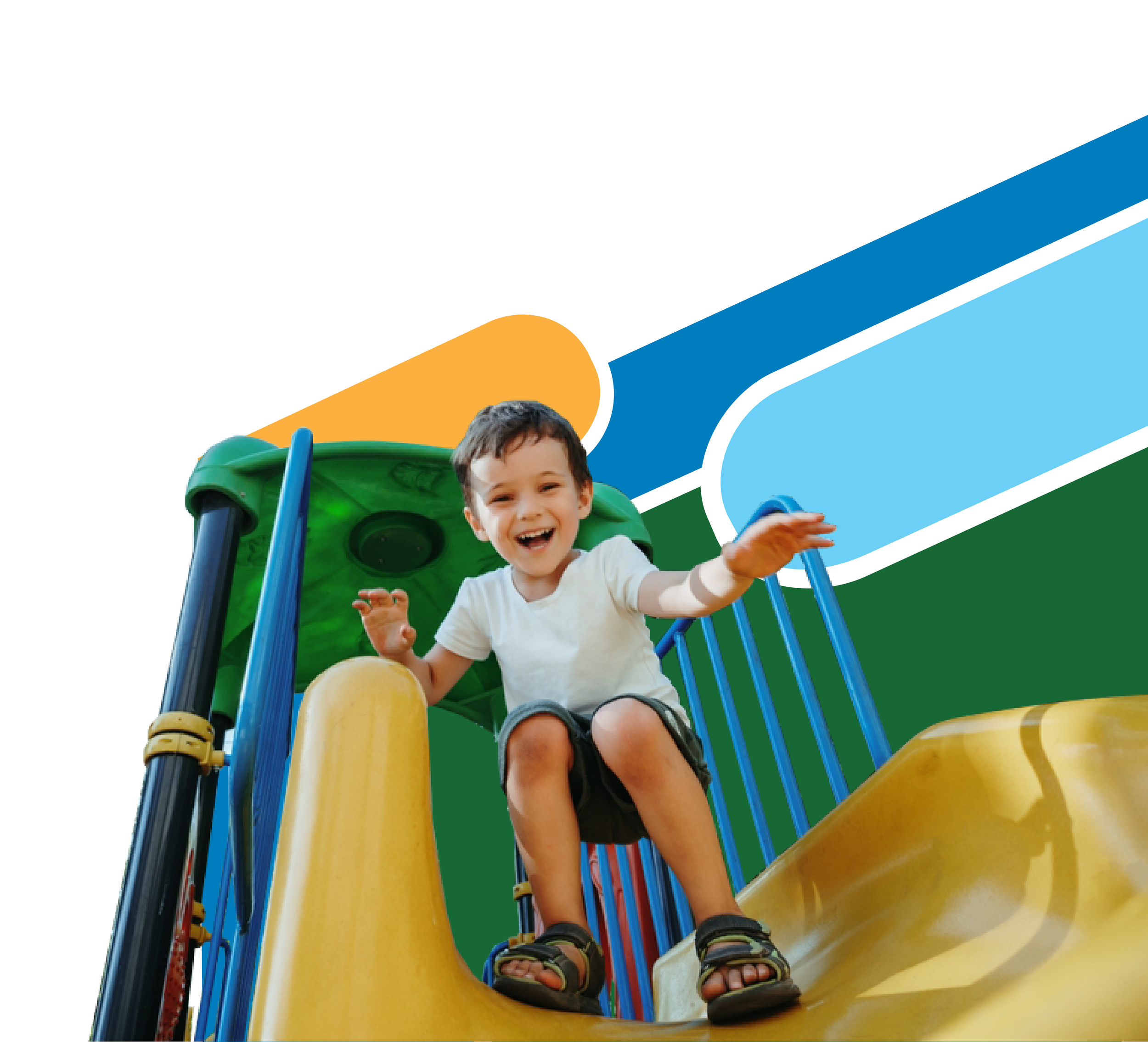 A child smiling and playing on a colorful playground slide.