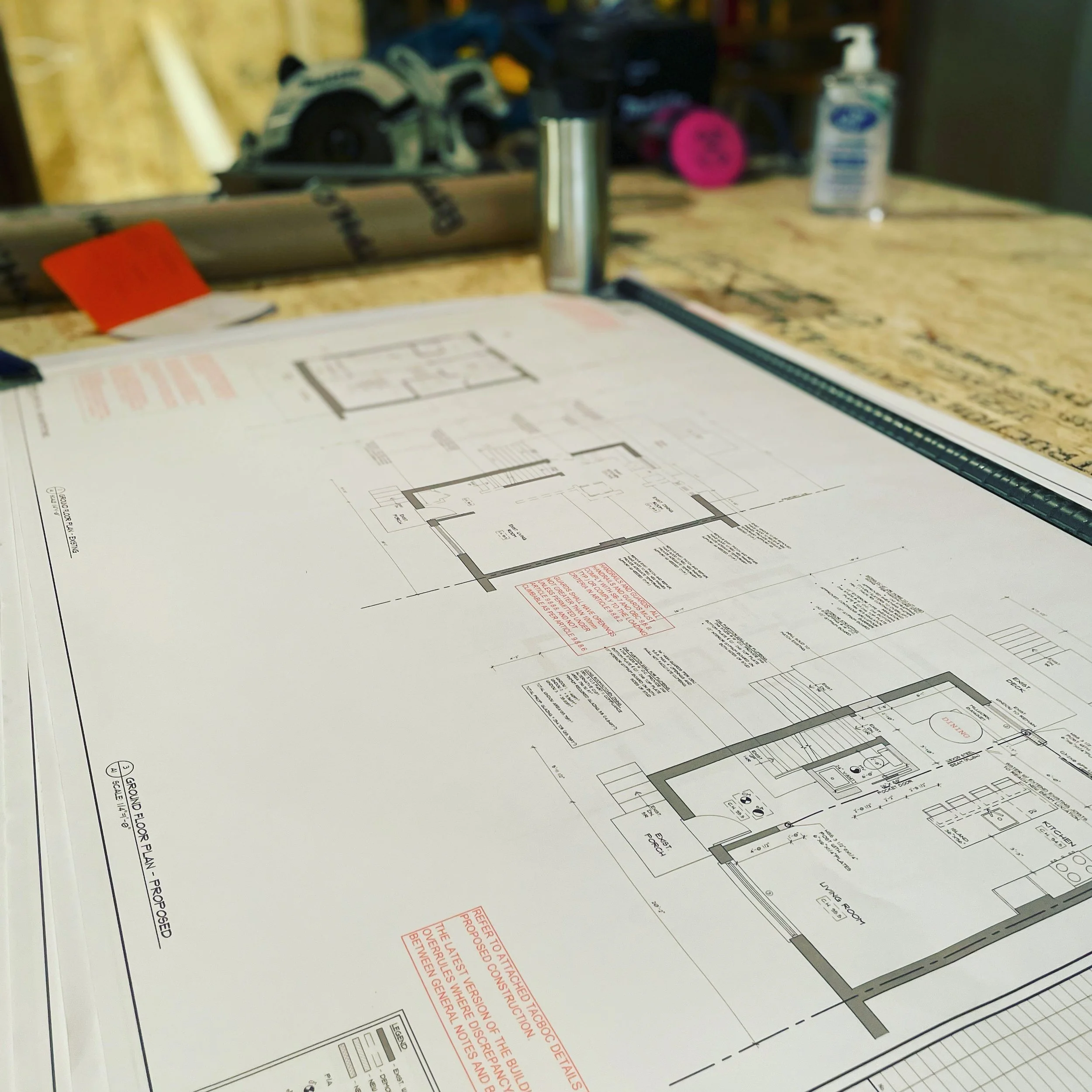 Architectural blueprint on a work table in a construction or design studio.