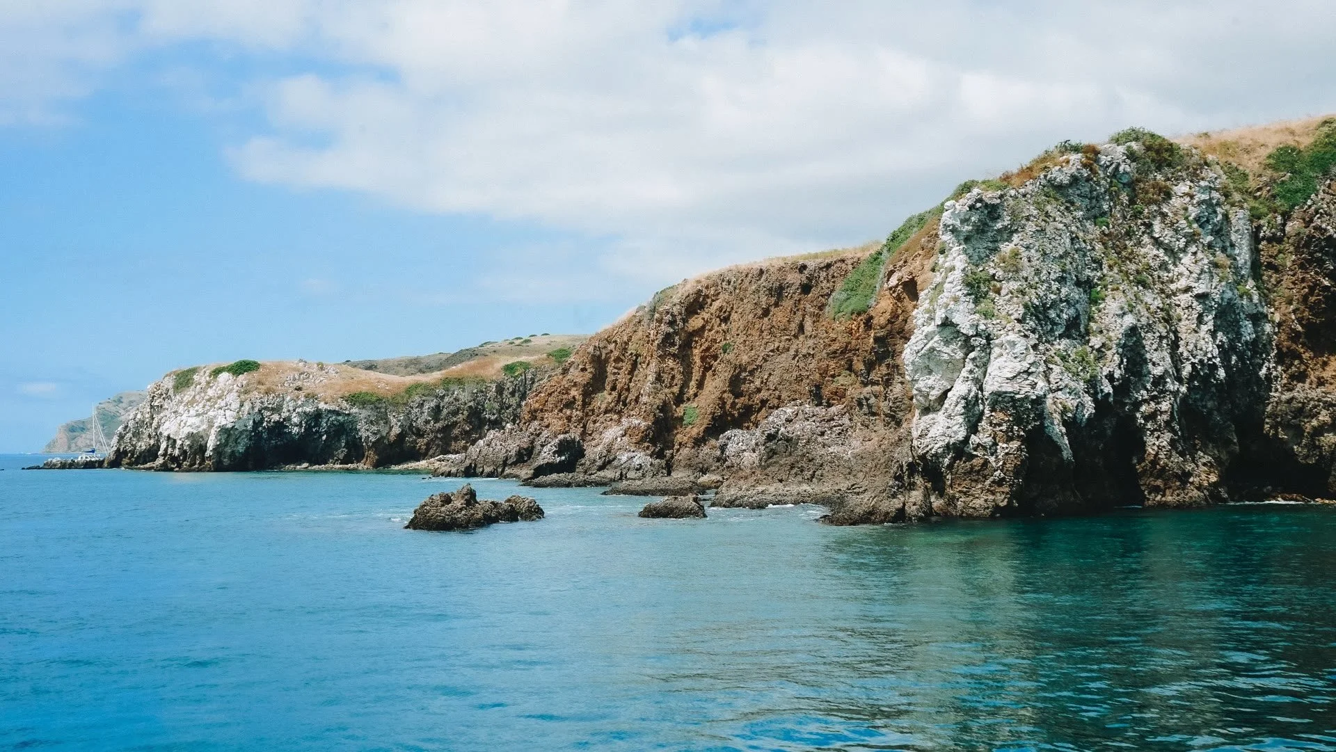 channel-islands-rocky-coastline-snorkeling-tour.jpg