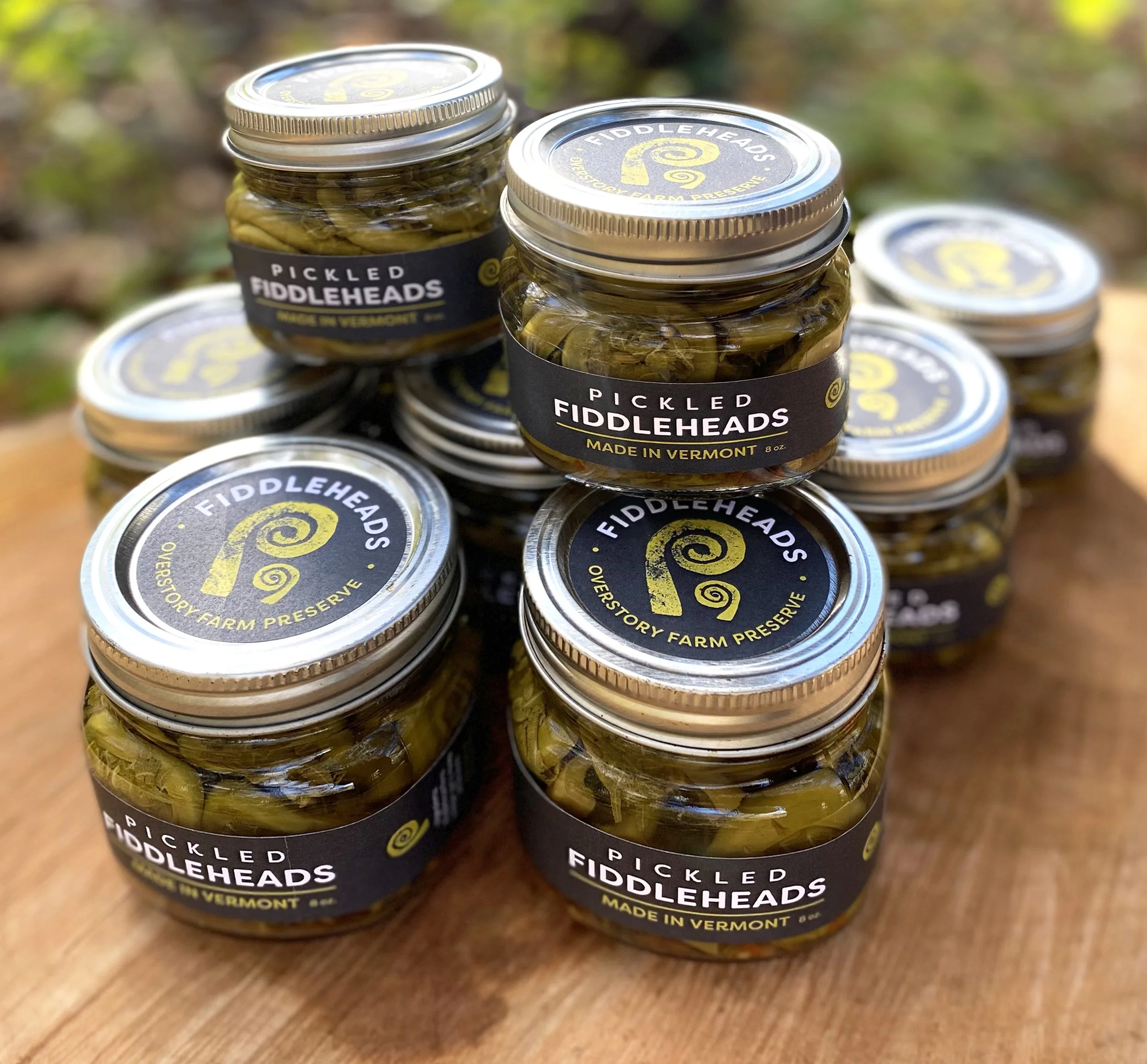 Multiple jars of Overstory Farm's pickled fiddleheads, made in Vermont.