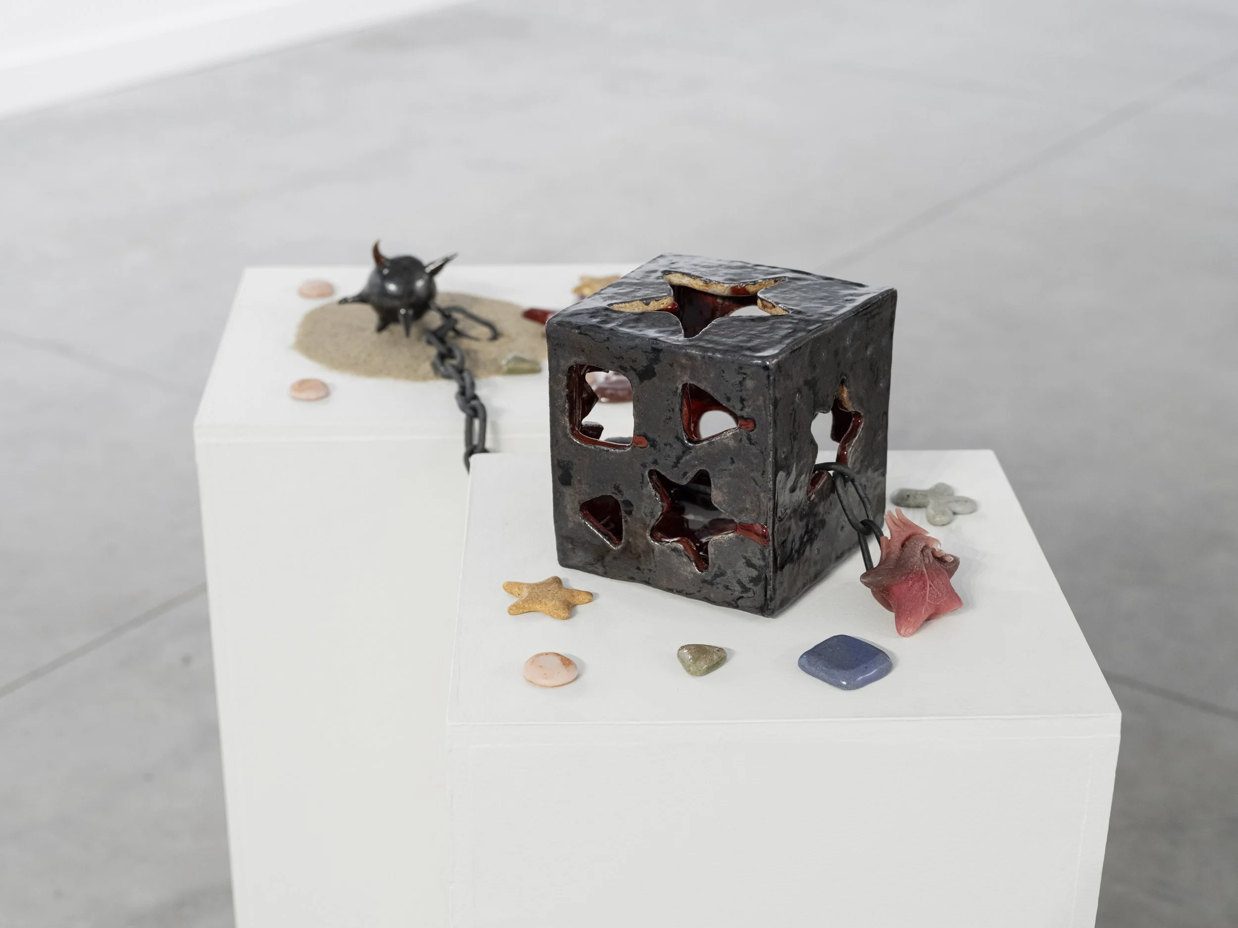 Lulu Luyao Chang / Am I Fitting In?, 2025 / glazed stoneware, animal claw, kintsugi urushi, wheat flour, tonoko powder / 6.25" x 6.25" x 6.75" (shape box) / 4" x 24" x 5" (chain)