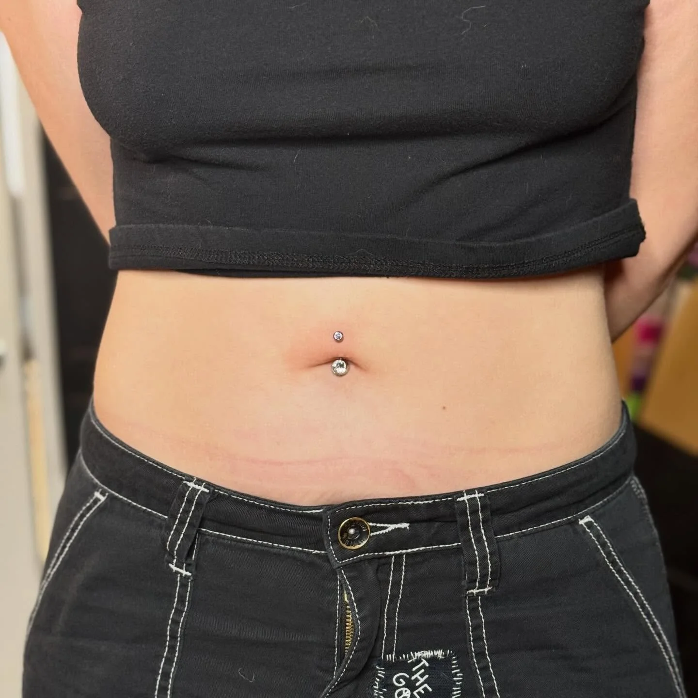 Serving sparkle ✨ 
Fresh navel piercing by @sarah_shanks207 

Sarah is primarily walk-in based, so call, message or stop by for availability! 

#navel #navelpiercing #bodyjewelry #bodypiercing #piercerbabes