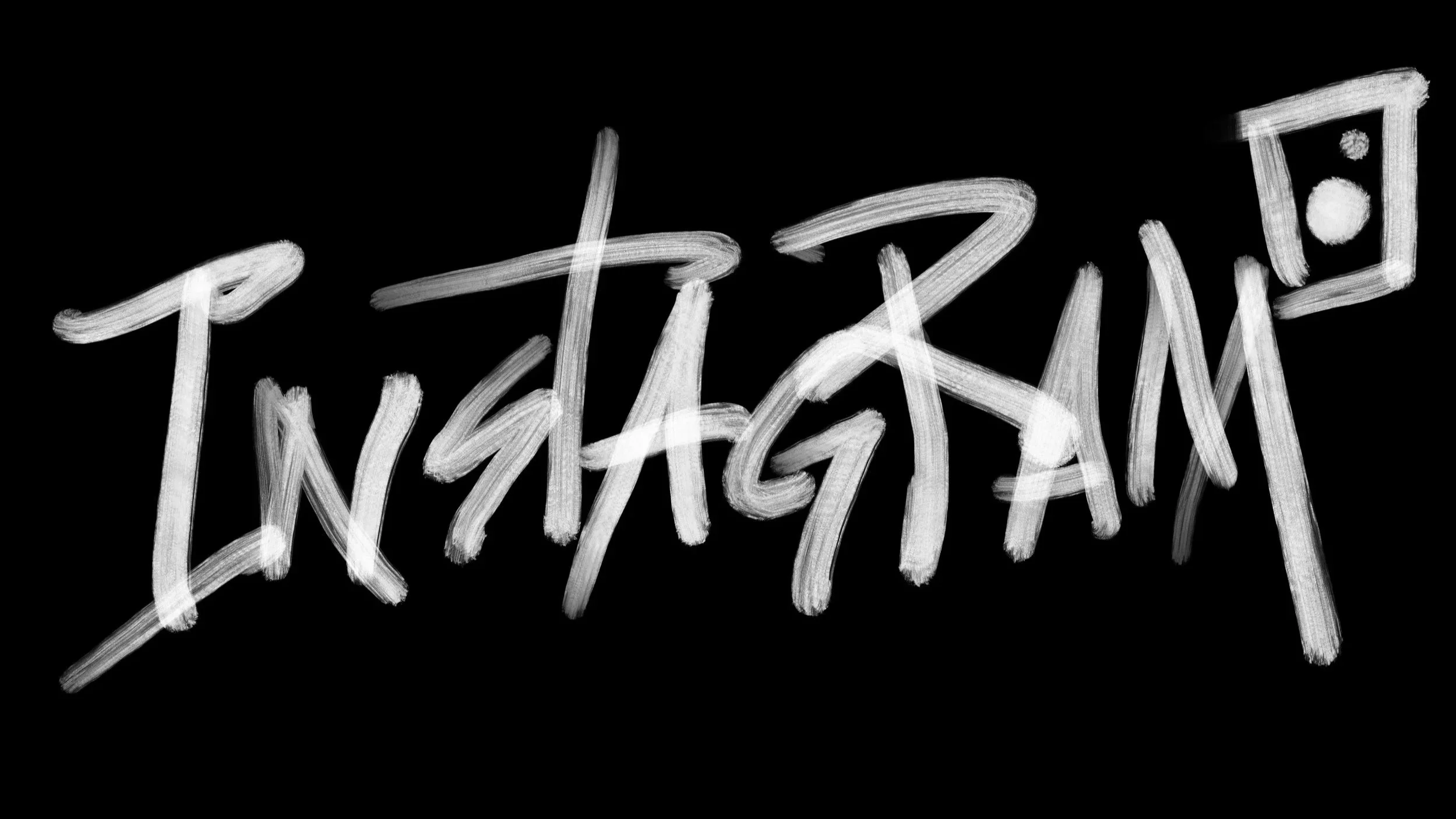 Handwritten white text on a black background that reads 'Tuesday AM' with a small musical note next to it.