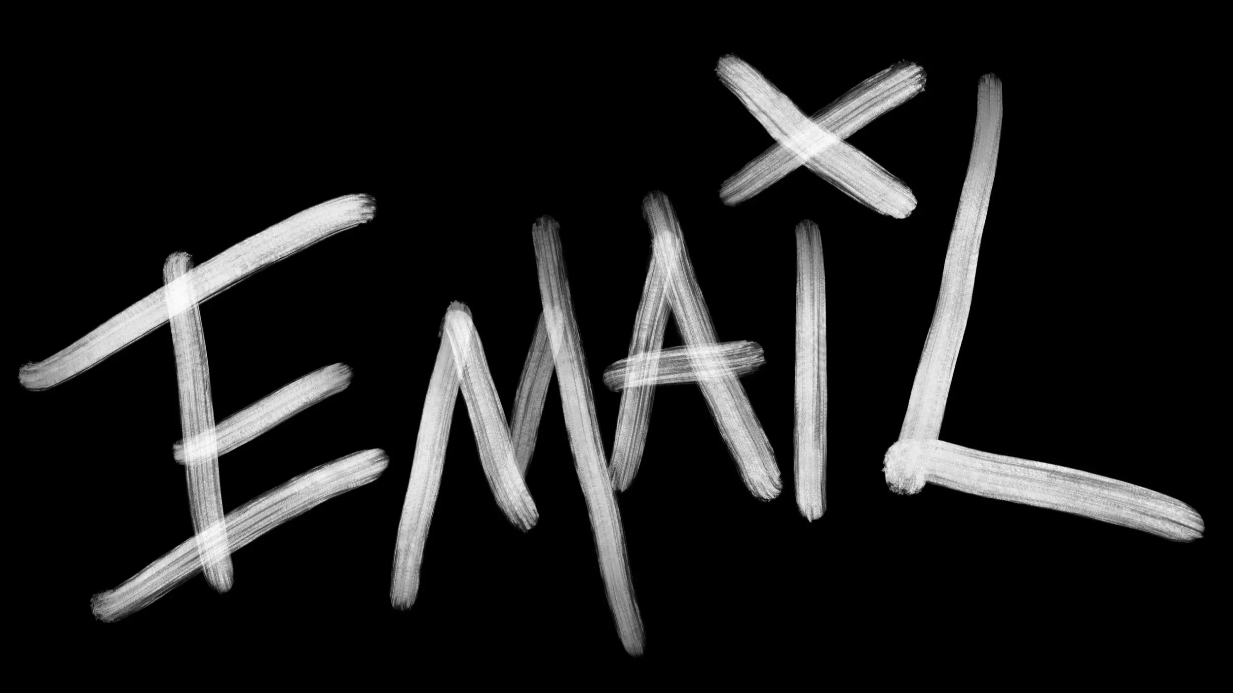 Handwritten white text on a black background that reads 'TEXAS'.