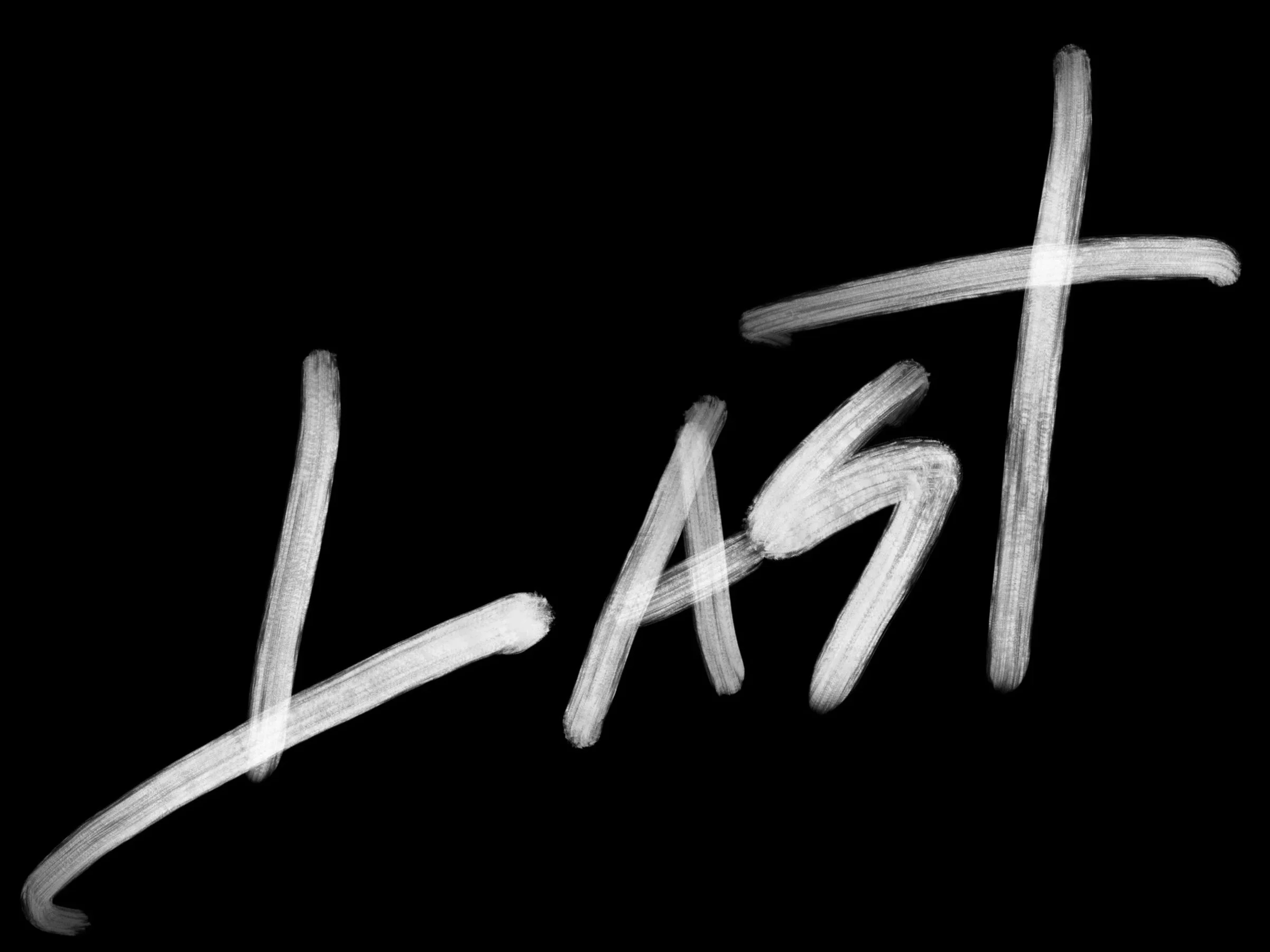 The word 'LEASH' written in white chalk on a blackboard.