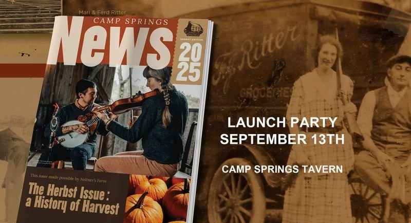 Magazine magazine titled 'Camp Springs News 2025' with a cover photo of a man and woman playing violin and guitar, pumpkins at the bottom, and an announcement for a launch party at Camp Springs Tavern on September 13th.