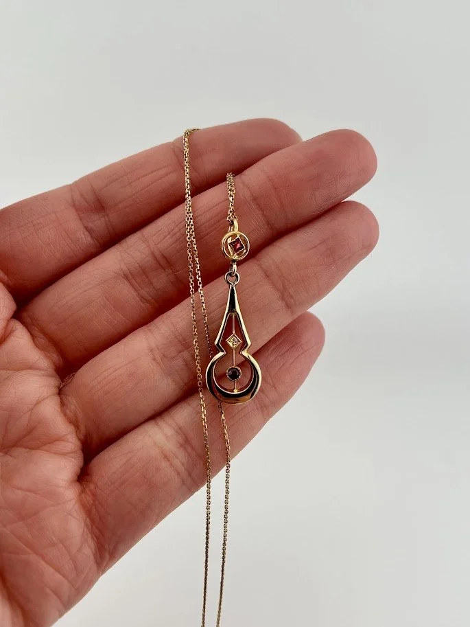 Late Victorian Ruby and Diamond Lavalier Pendant Necklace in 14K Yellow Gold