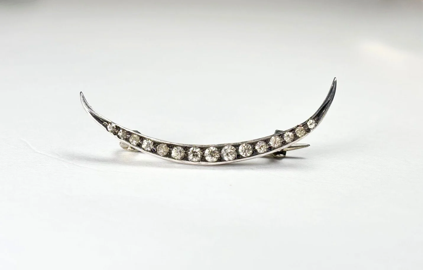 Late Edwardian Crescent Brooch with Clear Paste in Sterling Silver