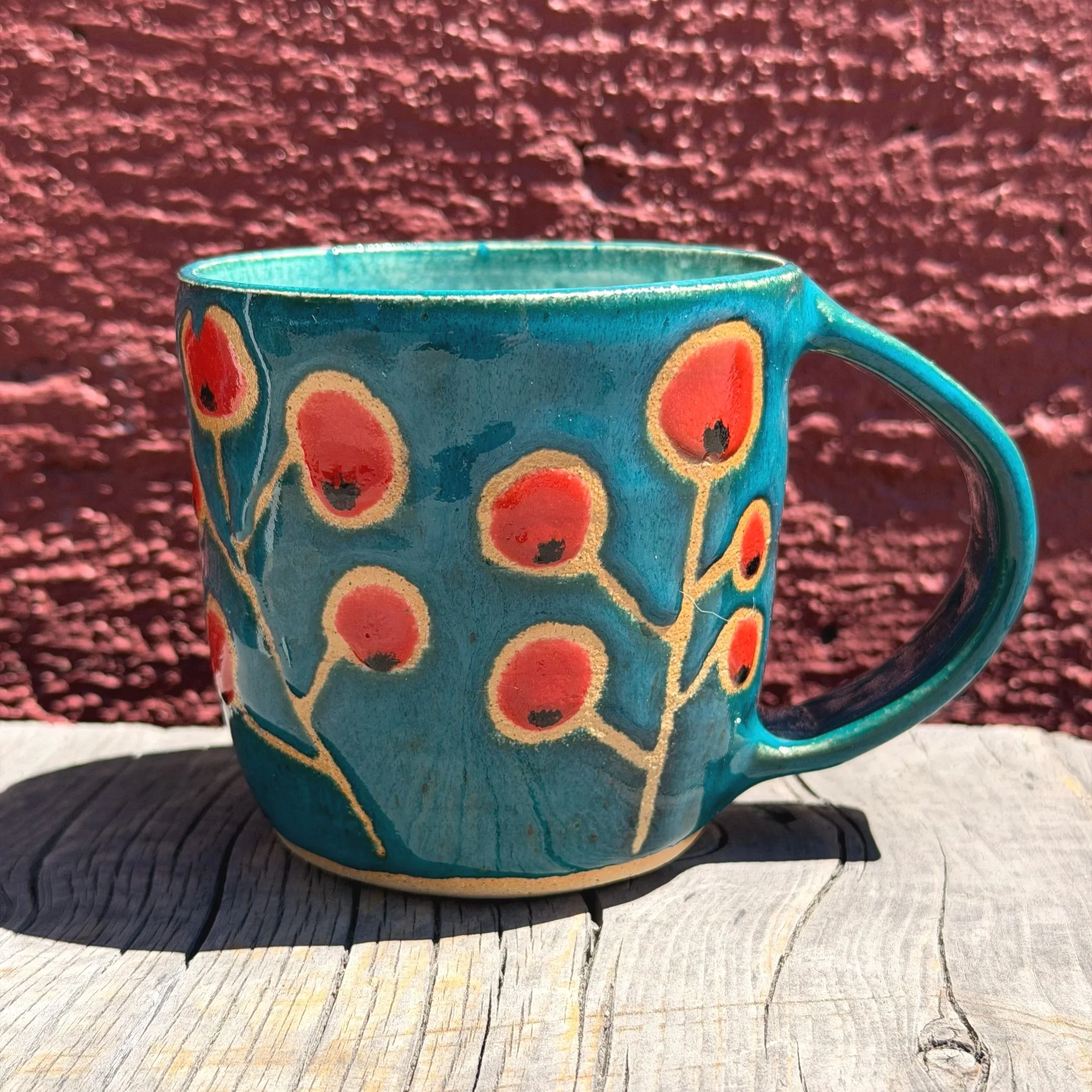 Handmade Wheel thrown red poppies on blue sky mug