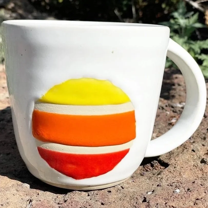 Two sided multi-colored circle wheel-thrown handmade stoneware mug