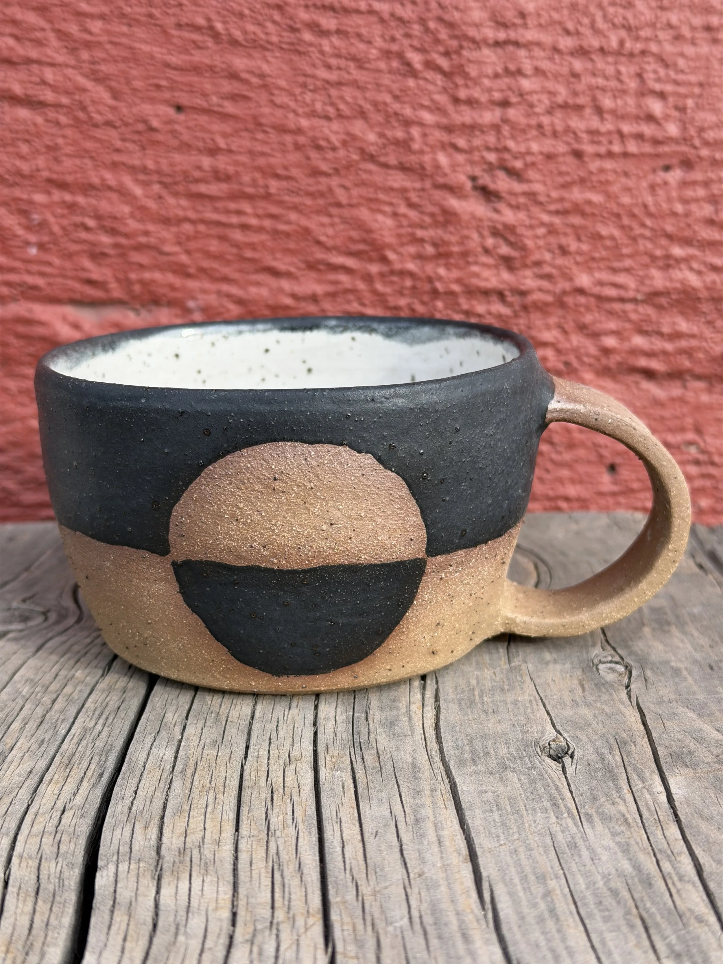 Mid-century modern half-circle glazed mug in brown speckled clay