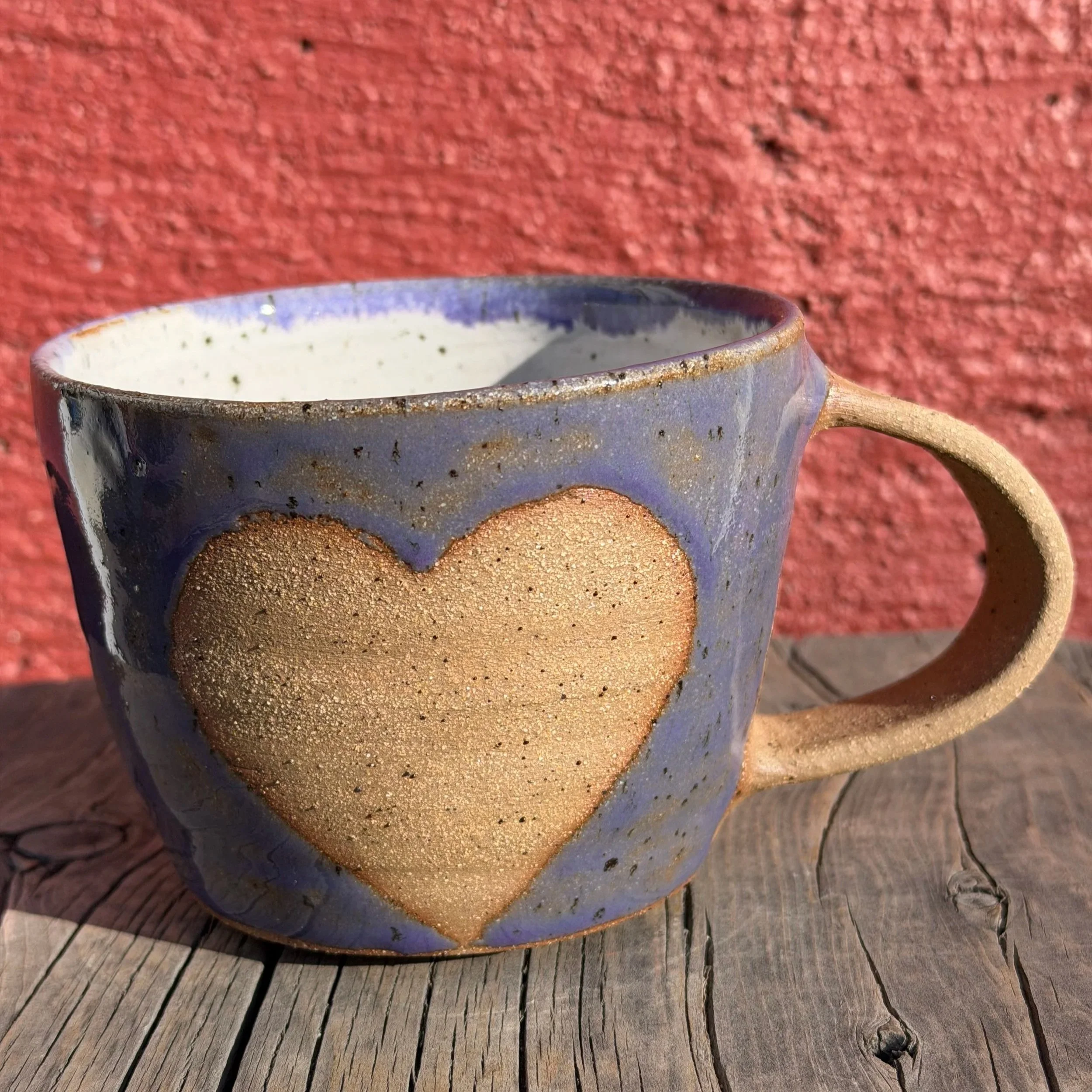 Burn out heart glazed mug in brown speckled clay