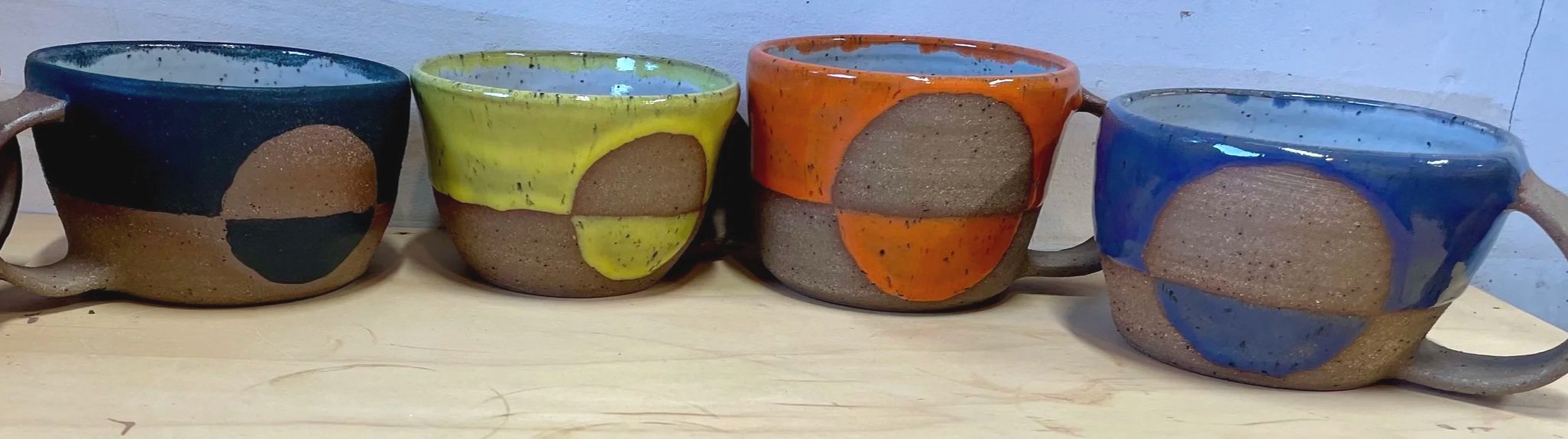 Handmade wheel thrown gloss or matte glaze with half-circle on brown clay with speckles mug modern design stoneware mid century modern