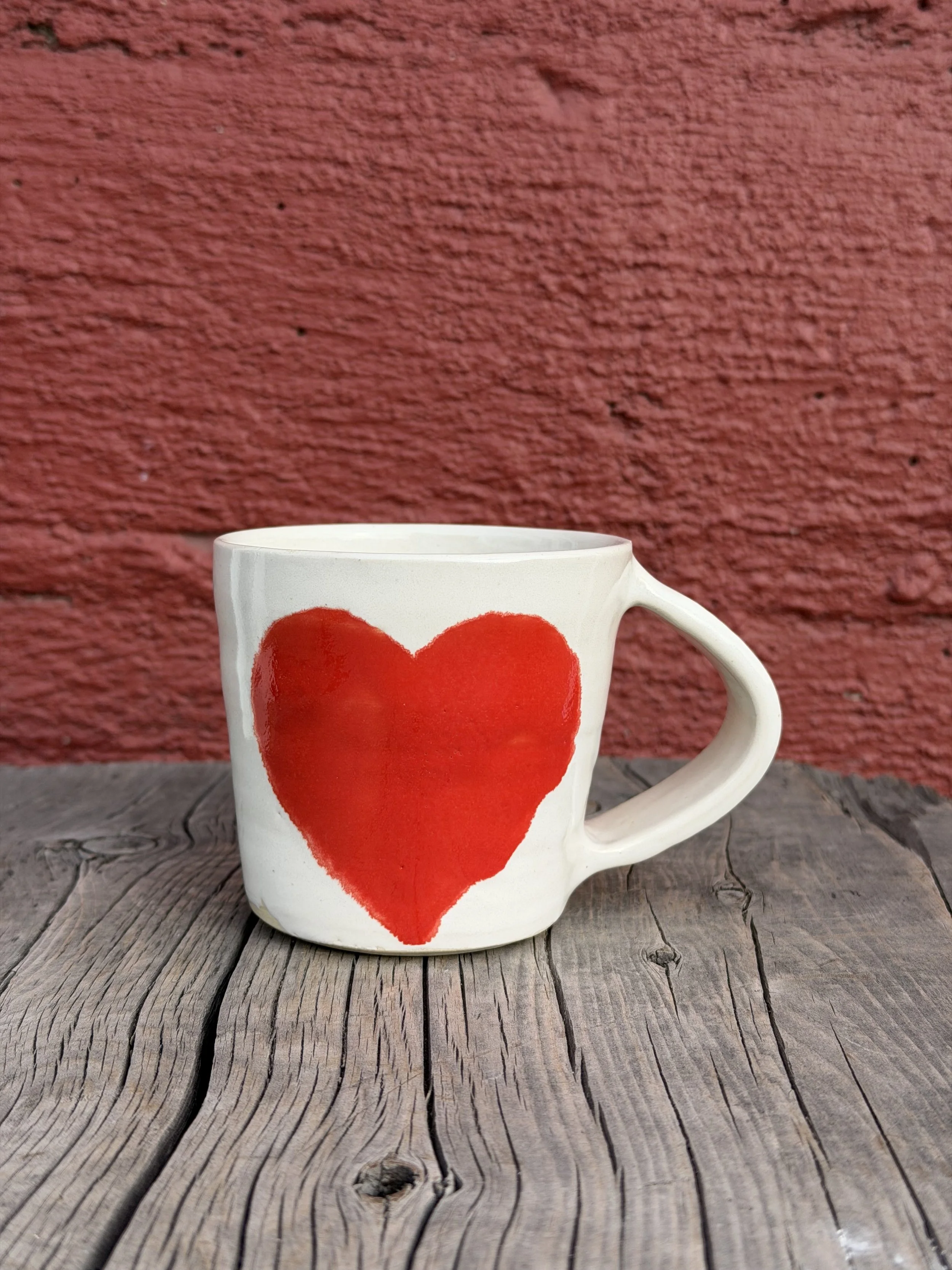 Handmade heart mug in white stoneware clay