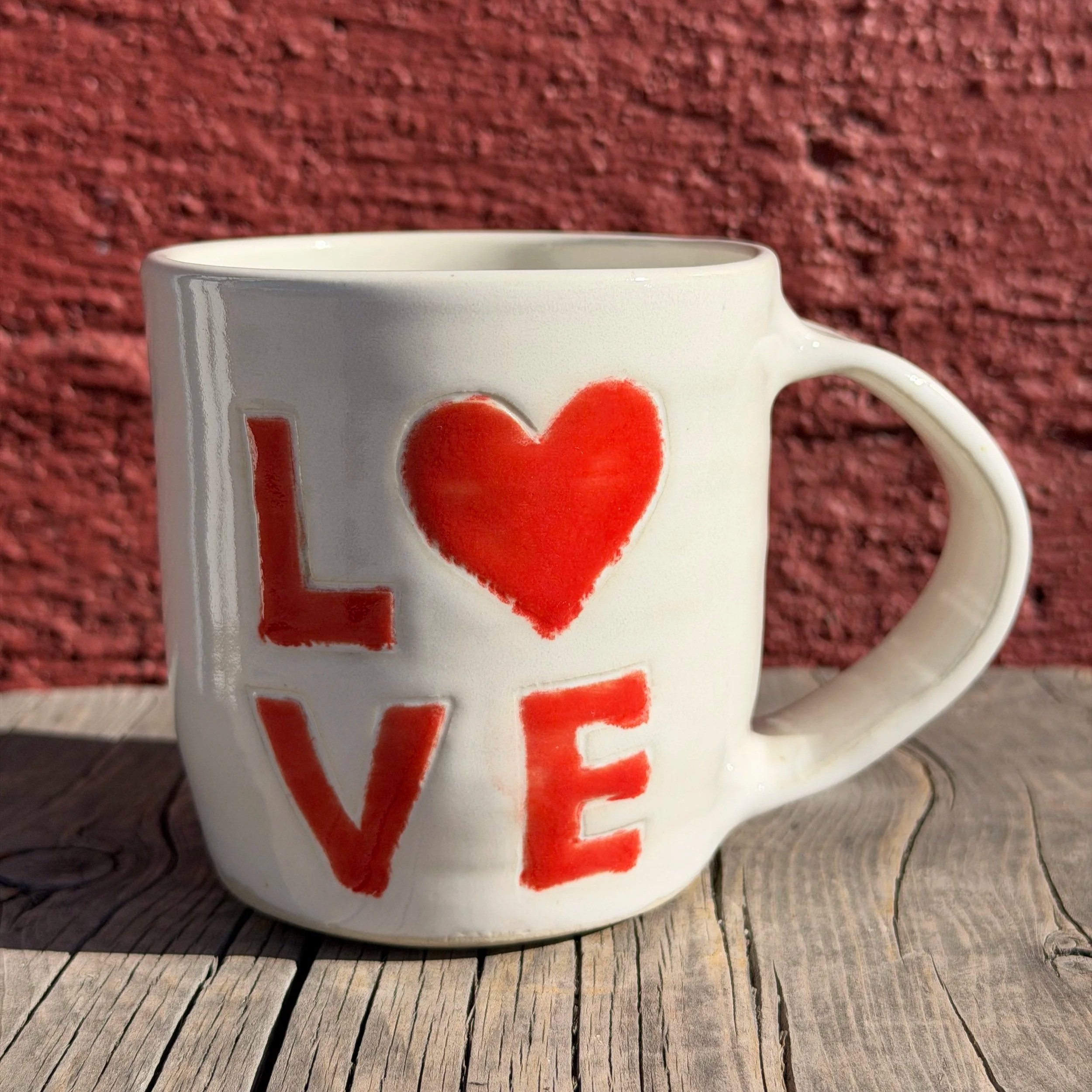 Handmade Love mug in white stoneware clay