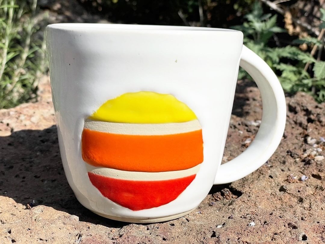 Handmade multi-color circle mug in white stoneware clay