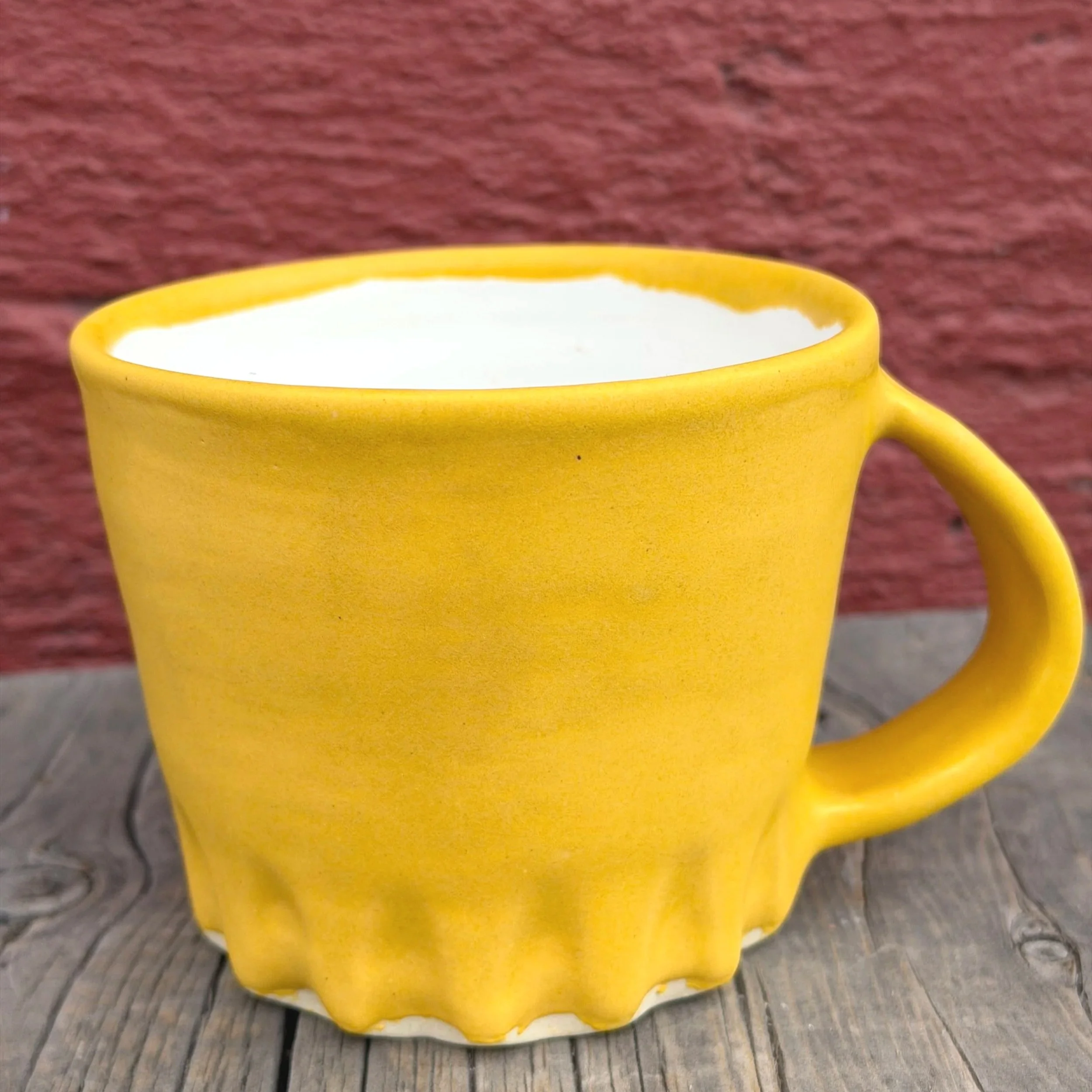 Turmeric yellow matte carved mug in white clay