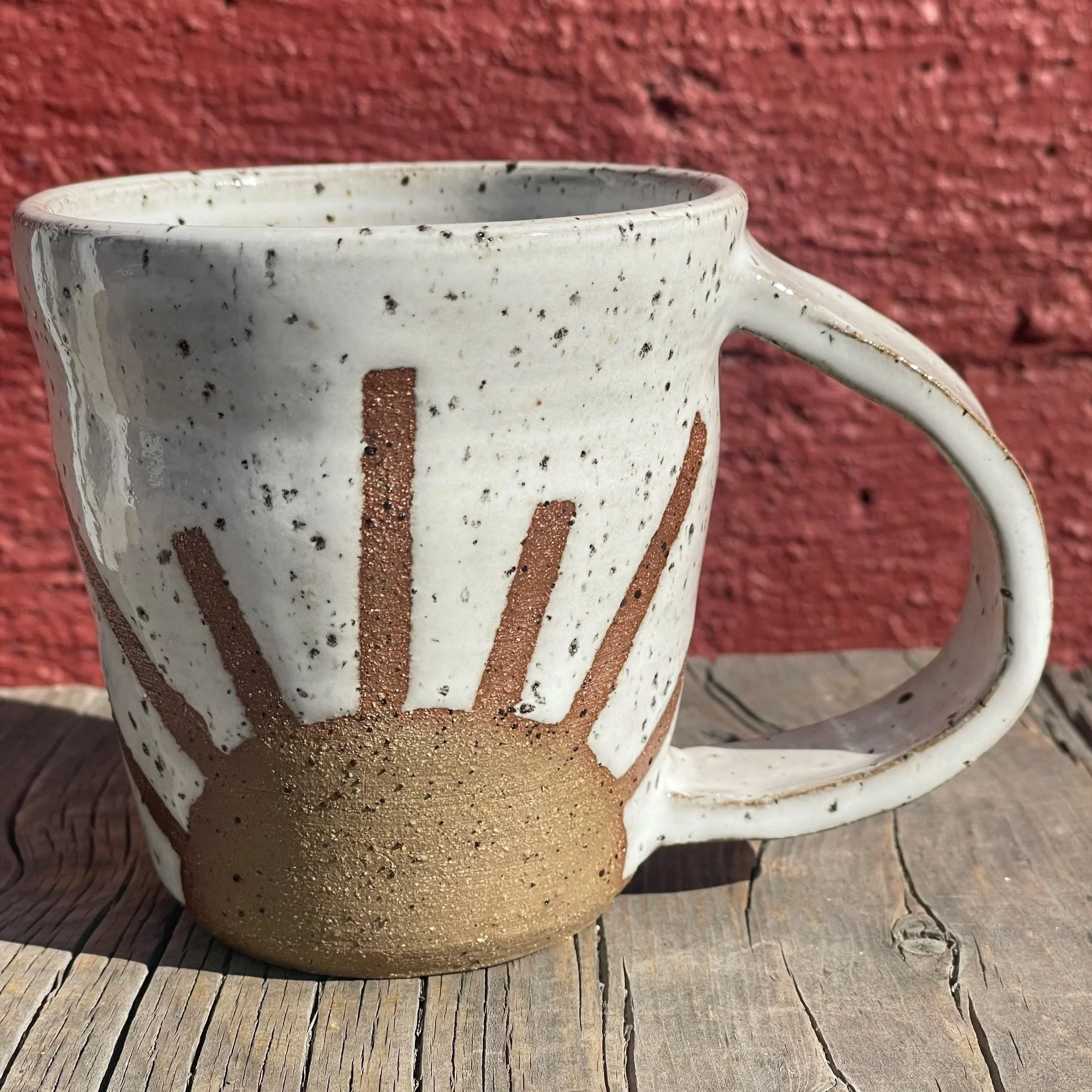 Handmade wheel thrown white sunshine on brown clay with speckles mug modern design stoneware
