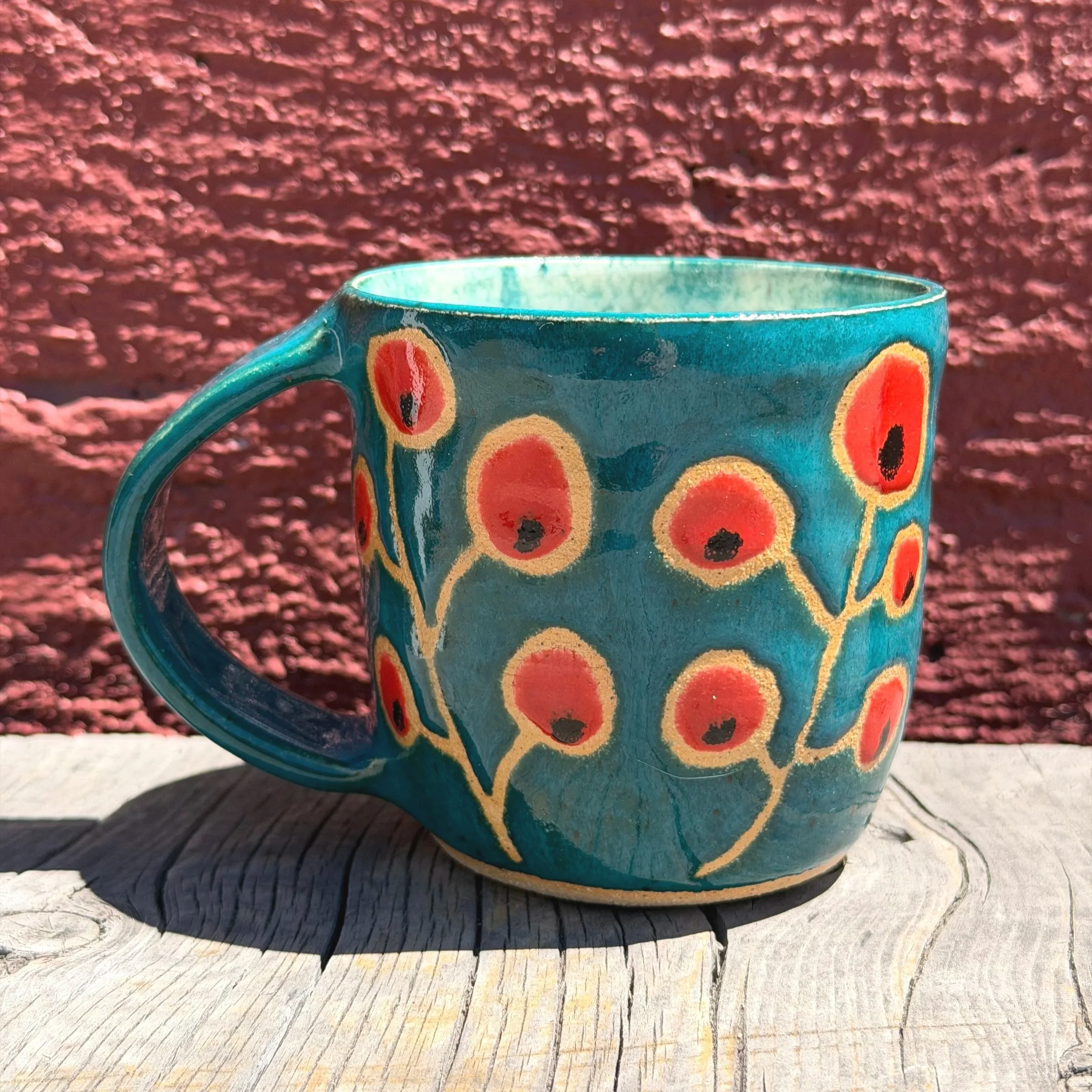 Red poppies on blue sky mug in white clay