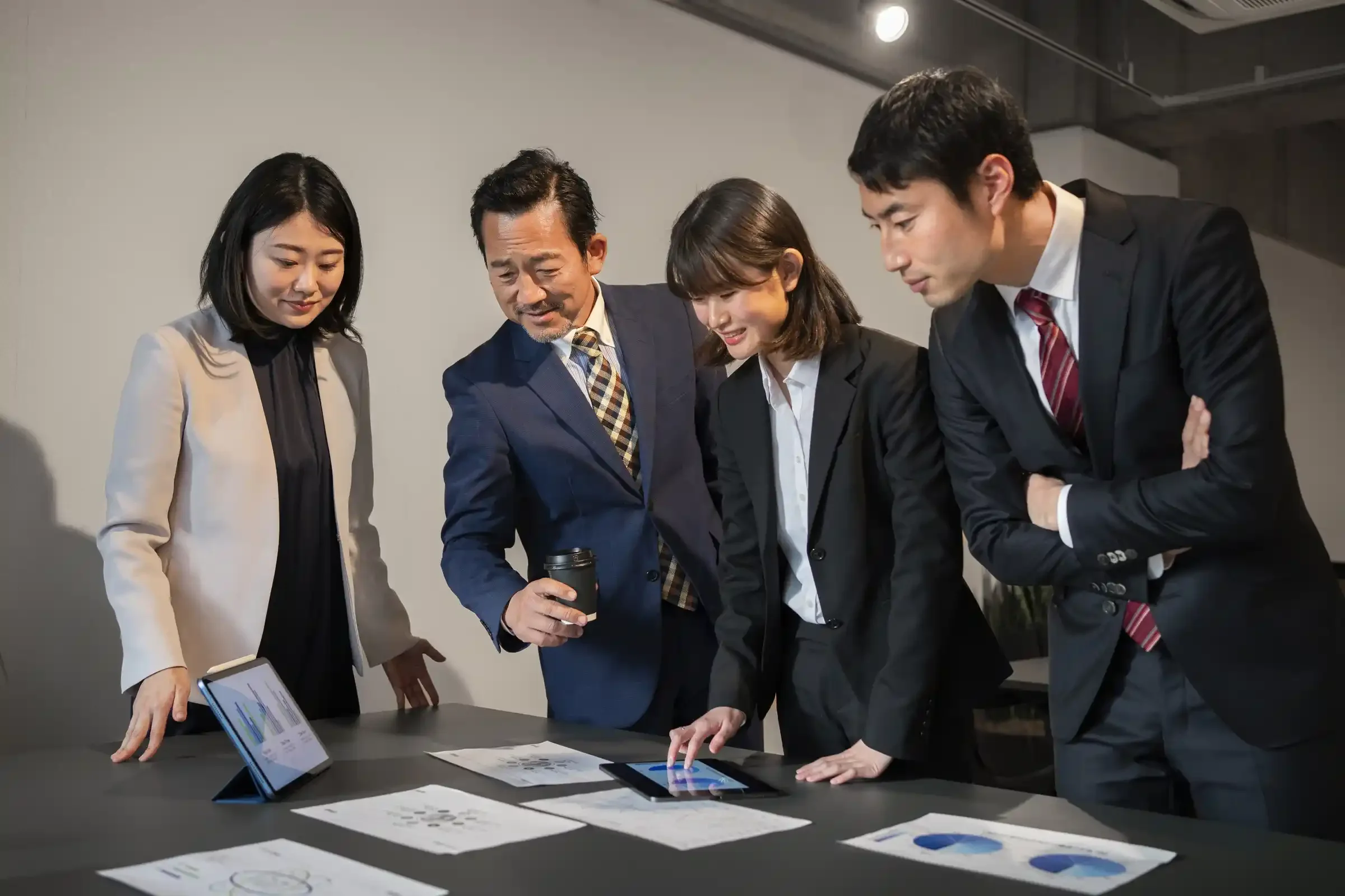 Technology executives discussing business strategy and growth in Asia