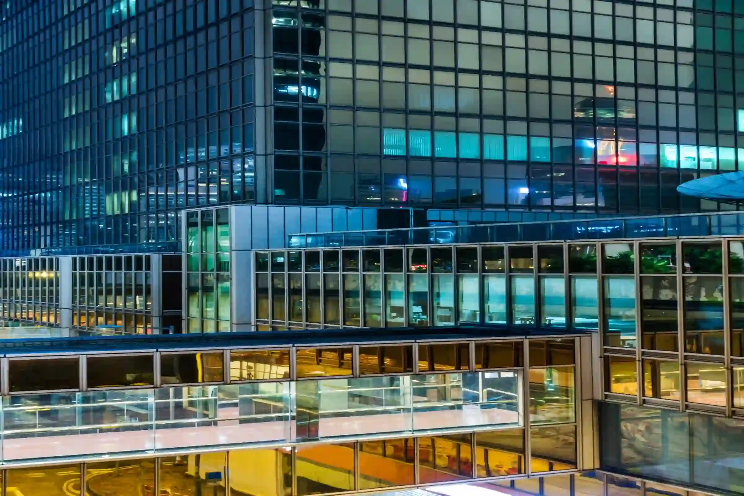 Modern glass architecture representing confidence, clarity and strategic investment decisions before committing capital in Korea and Asia.