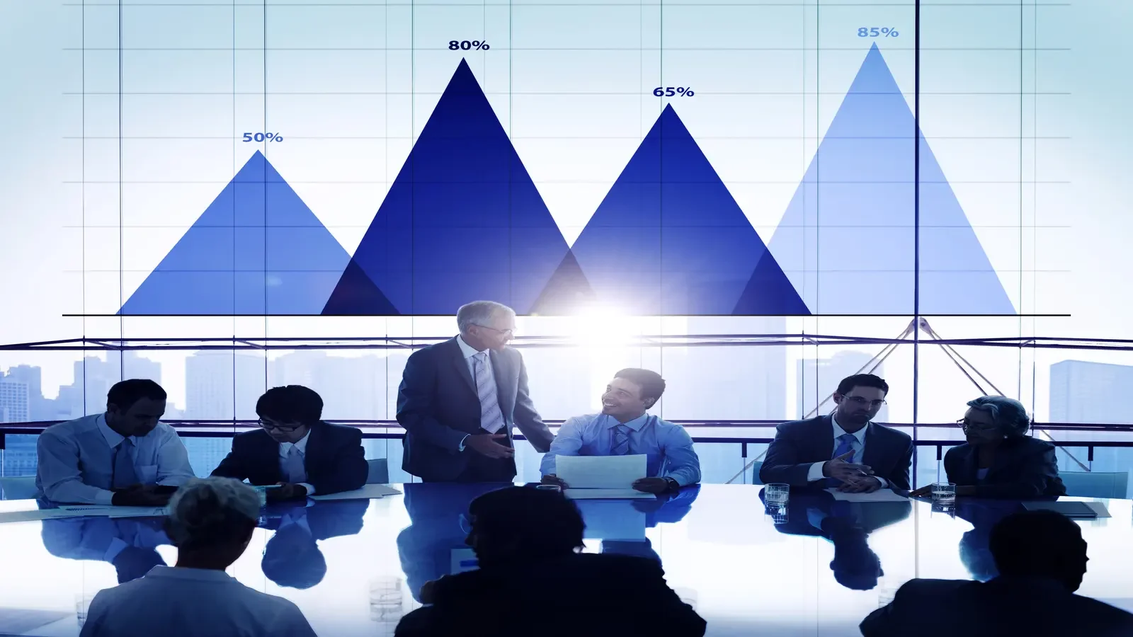 Senior executives reviewing renewable energy investment opportunities across Asia-Pacific using digital market intelligence, financial analysis and regional expansion planning.