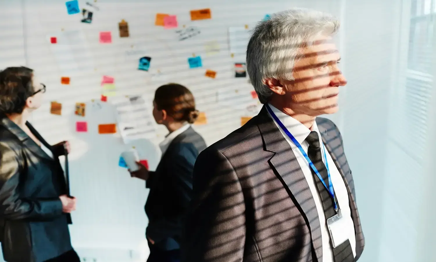 Single strategist focused on a chessboard representing specialist boutique advantage over larger consulting firms