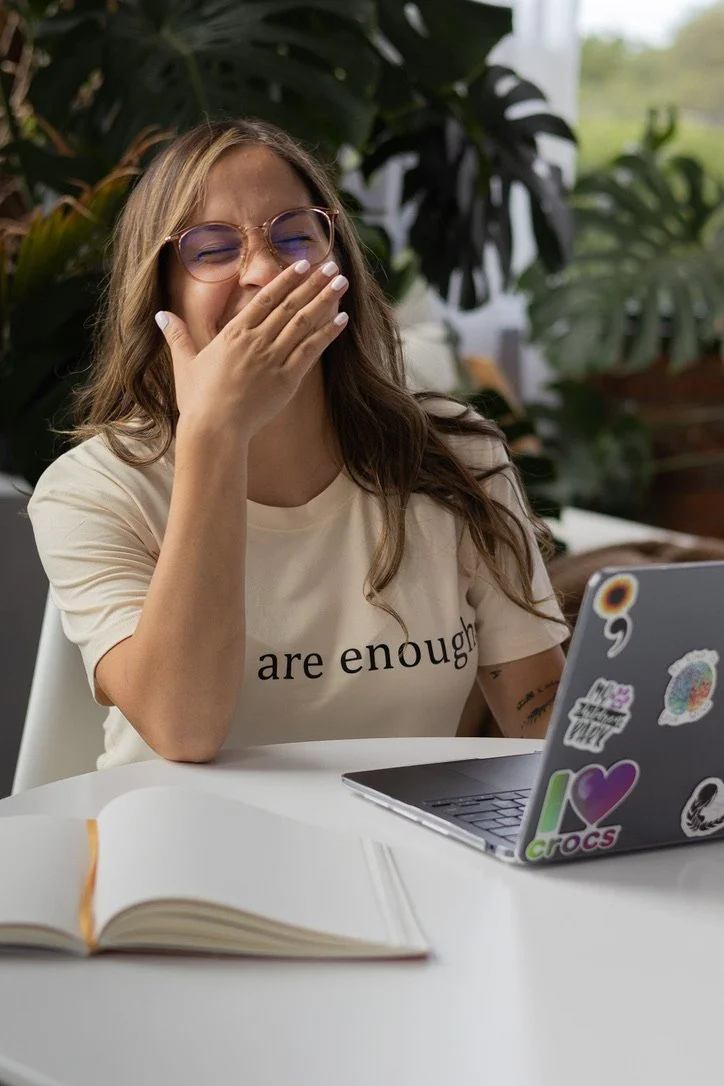 Jess laughing with a client