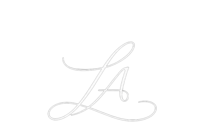 Elegant white script letter 'L' on a black background.