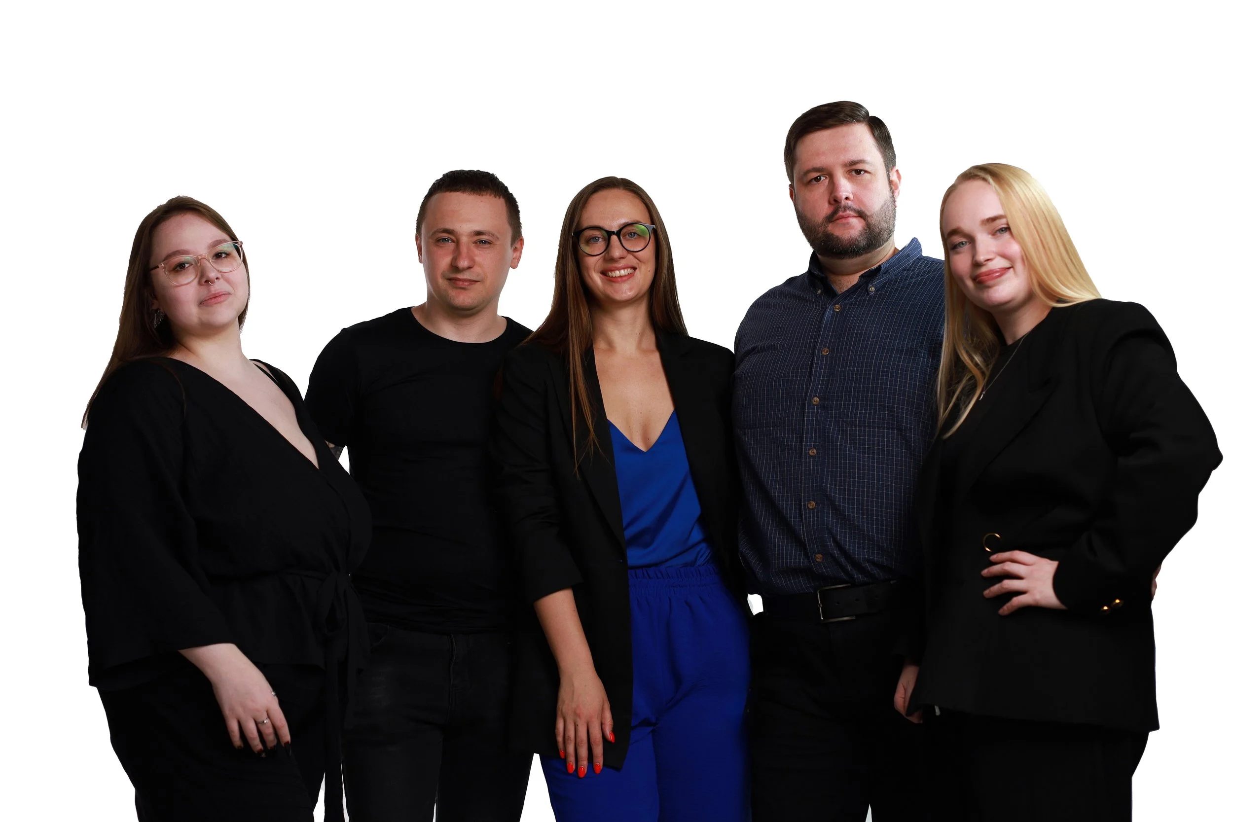 Group of five young professionals standing together against a white background.