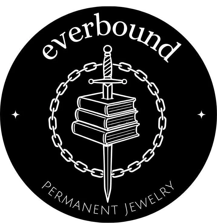 Black circular logo with white text reading 'everbound.' Inside, a chained circle surrounds a sword piercing through a stack of four books. Below, the text reads 'PERMANENT JEWELRY.'