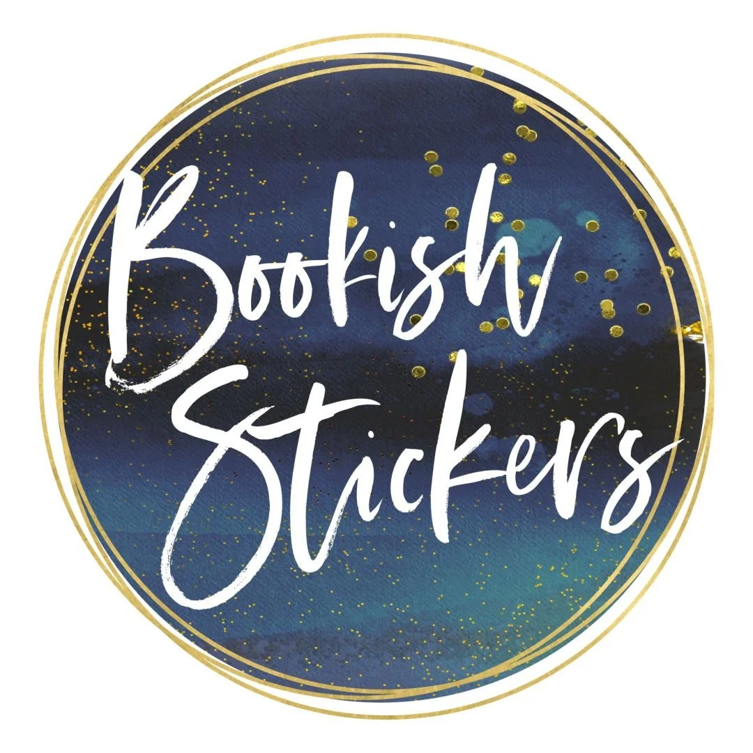 Circular sticker with a dark blue and gold watercolor background, gold splatters, and the words 'Bookish Stickers' in white handwritten font.