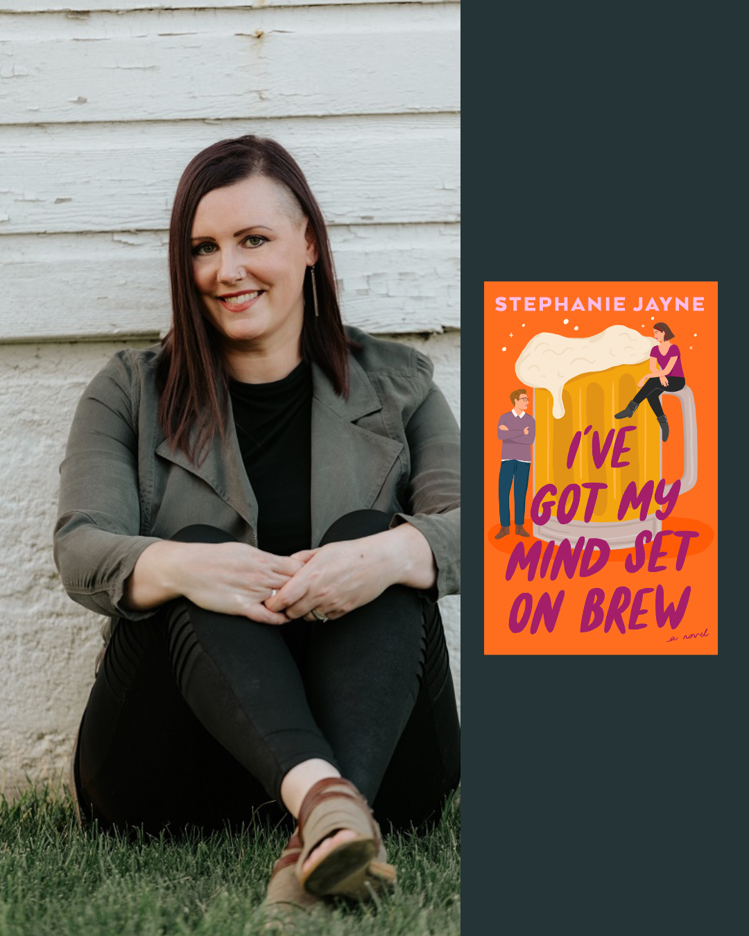 A woman sitting outside on grass, leaning against a white wooden wall, smiling at the camera.